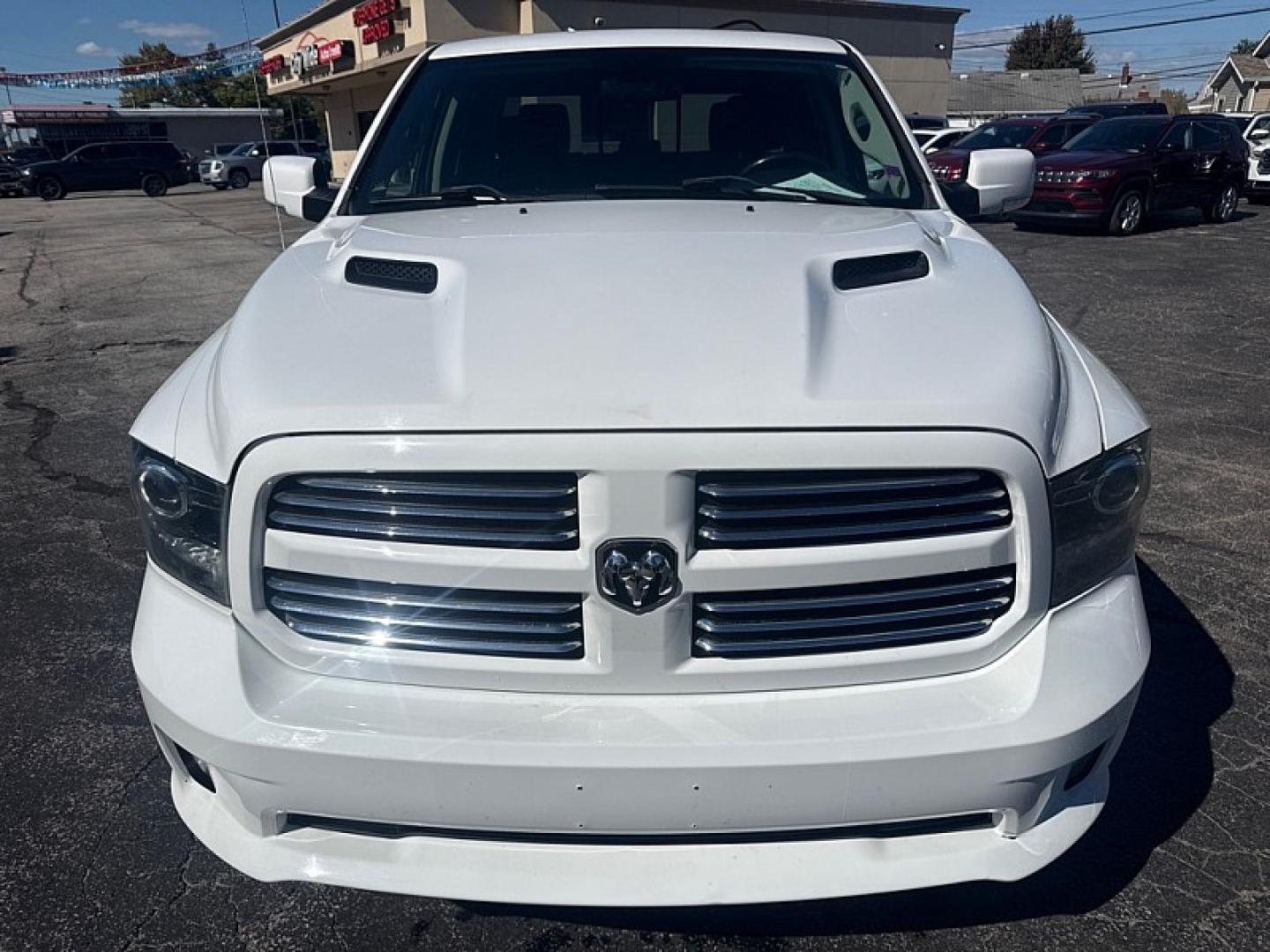 2014 WHITE /BLACK RAM 1500 Sport Crew Cab SWB 4WD (1C6RR7MT7ES) with an 5.7L V8 OHV 16V engine, 6-Speed Automatic transmission, located at 3304 Woodville Road, Northwood, OH, 43619, (419) 210-8019, 41.612694, -83.480743 - Your #1 Destination for Auto Loans and mdash;No Matter Your Credit!At our dealership, we believe everyone deserves the opportunity to drive their dream car and mdash;whether you have good credit, bad credit, or no credit at all. With a wide selection of hundreds of cars, trucks, and SUVs, you'll fin- Photo#7