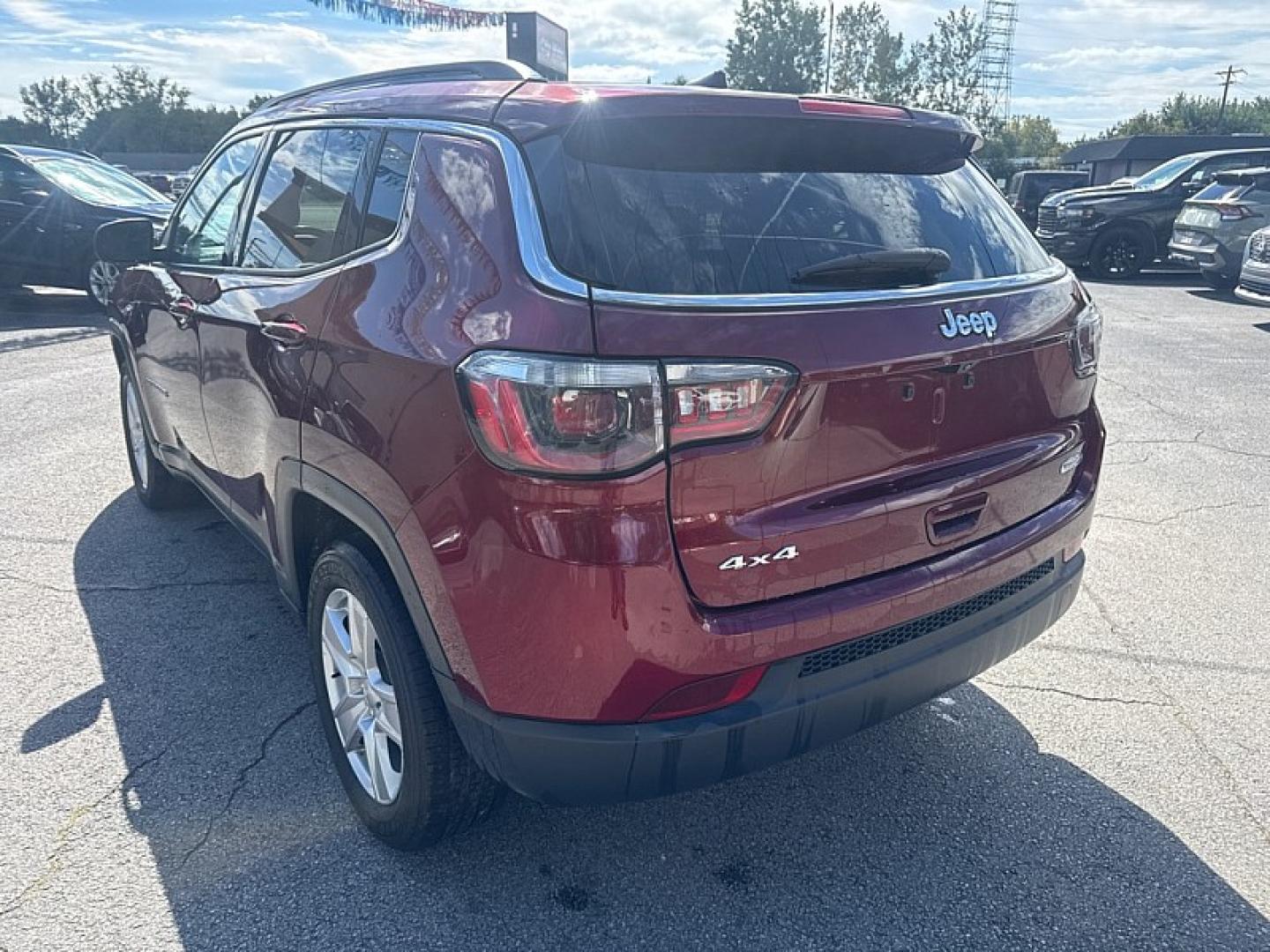 2022 MAROON /BLACK Jeep Compass Latitude 4WD (3C4NJDBB3NT) with an 2.4L L4 DOHC 16V engine, Automatic 9-Spd transmission, located at 3304 Woodville Road, Northwood, OH, 43619, (419) 210-8019, 41.612694, -83.480743- Photo#2
