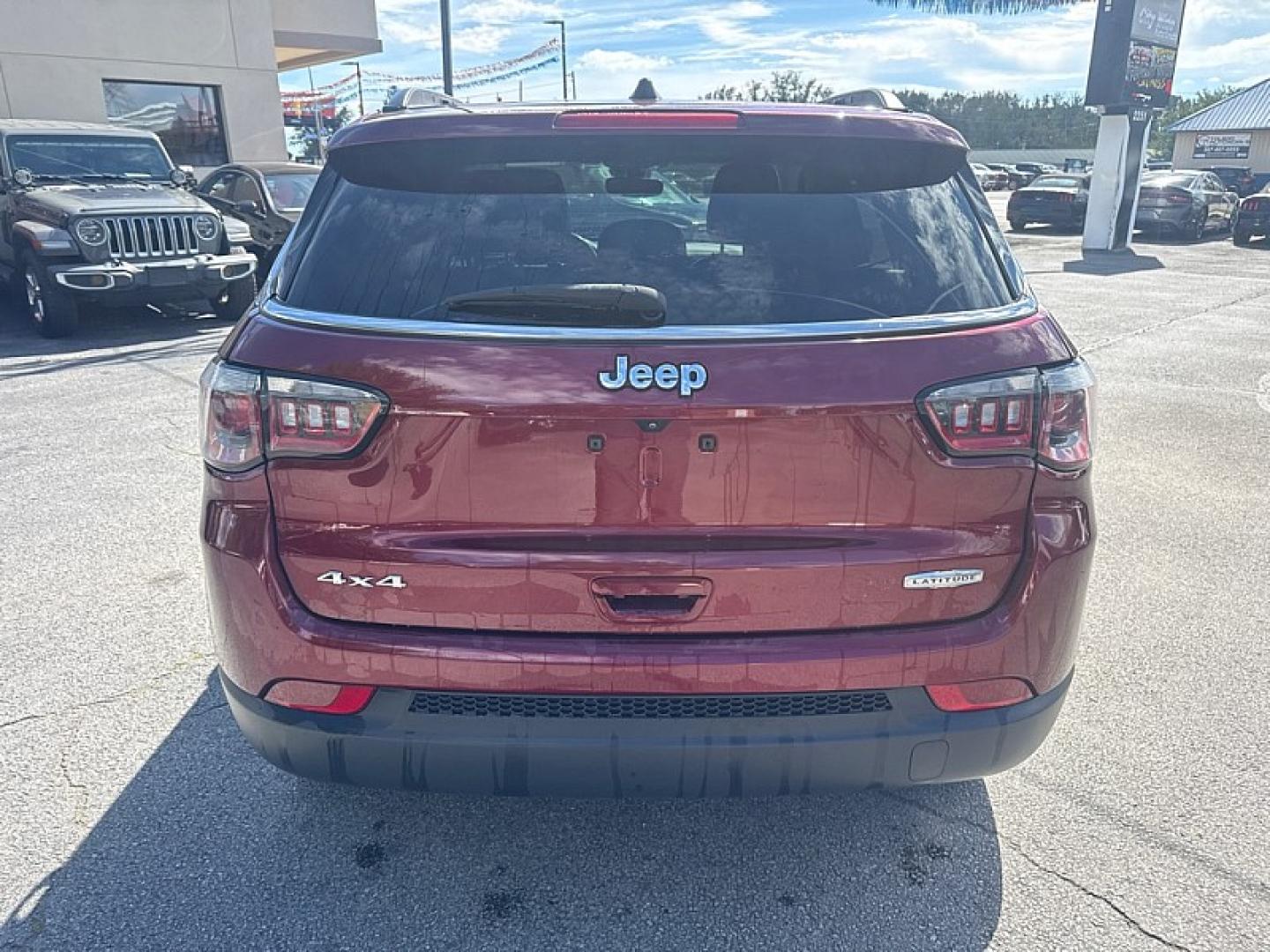 2022 MAROON /BLACK Jeep Compass Latitude 4WD (3C4NJDBB3NT) with an 2.4L L4 DOHC 16V engine, Automatic 9-Spd transmission, located at 3304 Woodville Road, Northwood, OH, 43619, (419) 210-8019, 41.612694, -83.480743- Photo#3