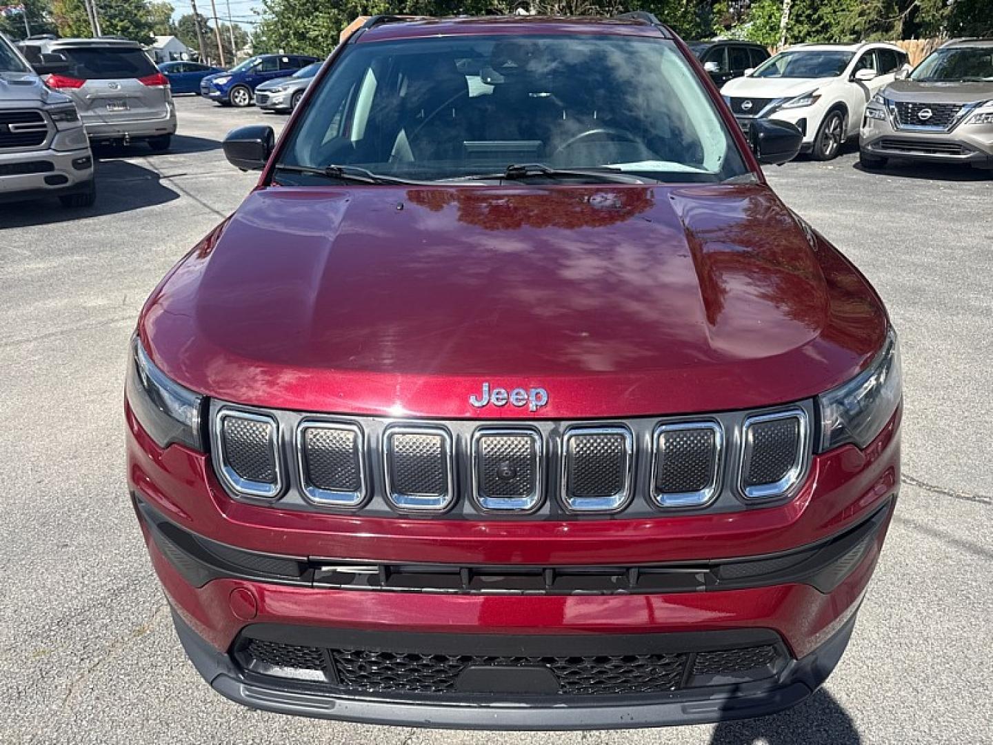 2022 MAROON /BLACK Jeep Compass Latitude 4WD (3C4NJDBB3NT) with an 2.4L L4 DOHC 16V engine, Automatic 9-Spd transmission, located at 3304 Woodville Road, Northwood, OH, 43619, (419) 210-8019, 41.612694, -83.480743- Photo#7