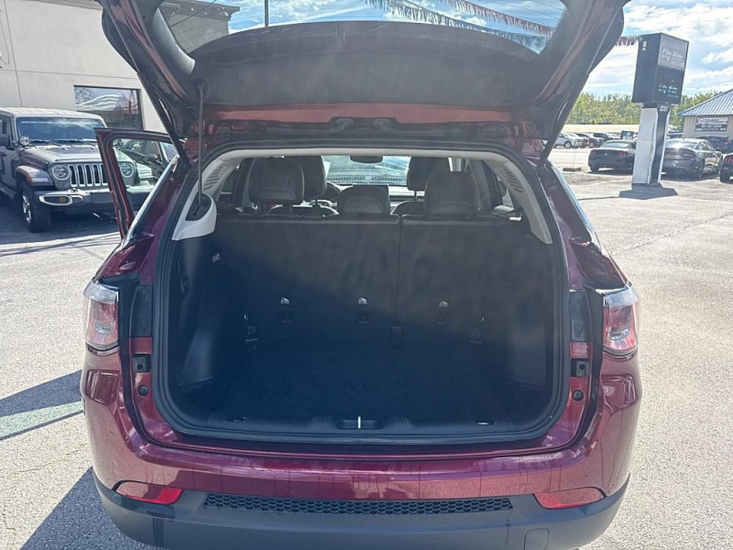 2022 MAROON /BLACK Jeep Compass Latitude 4WD (3C4NJDBB3NT) with an 2.4L L4 DOHC 16V engine, Automatic 9-Spd transmission, located at 3304 Woodville Road, Northwood, OH, 43619, (419) 210-8019, 41.612694, -83.480743- Photo#19