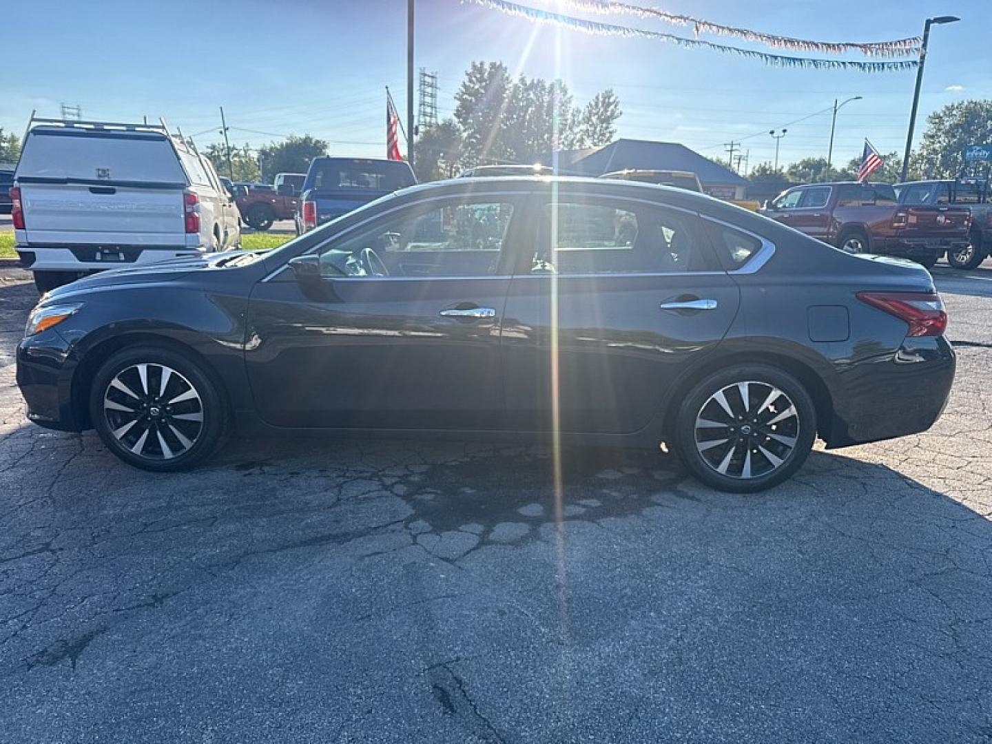 2018 BLUE /BLACK Nissan Altima 2.5 (1N4AL3AP6JC) with an 2.5L L4 DOHC 16V engine, CVT transmission, located at 3304 Woodville Road, Northwood, OH, 43619, (419) 210-8019, 41.612694, -83.480743- Photo#1