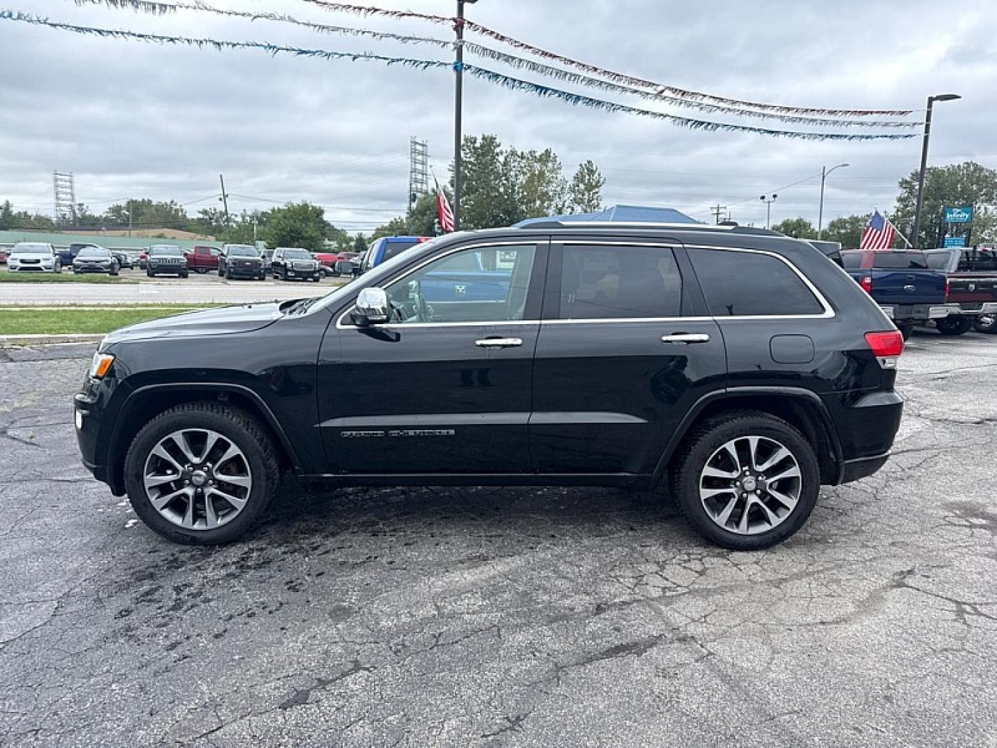 2018 BLACK /BLACK Jeep Grand Cherokee Overland 4WD (1C4RJFCG8JC) with an 3.6L V6 DOHC 24V engine, 8A transmission, located at 3304 Woodville Road, Northwood, OH, 43619, (419) 210-8019, 41.612694, -83.480743 - Your #1 Destination for Auto Loans and mdash;No Matter Your Credit!At our dealership, we believe everyone deserves the opportunity to drive their dream car and mdash;whether you have good credit, bad credit, or no credit at all. With a wide selection of hundreds of cars, trucks, and SUVs, you'll fin- Photo#1