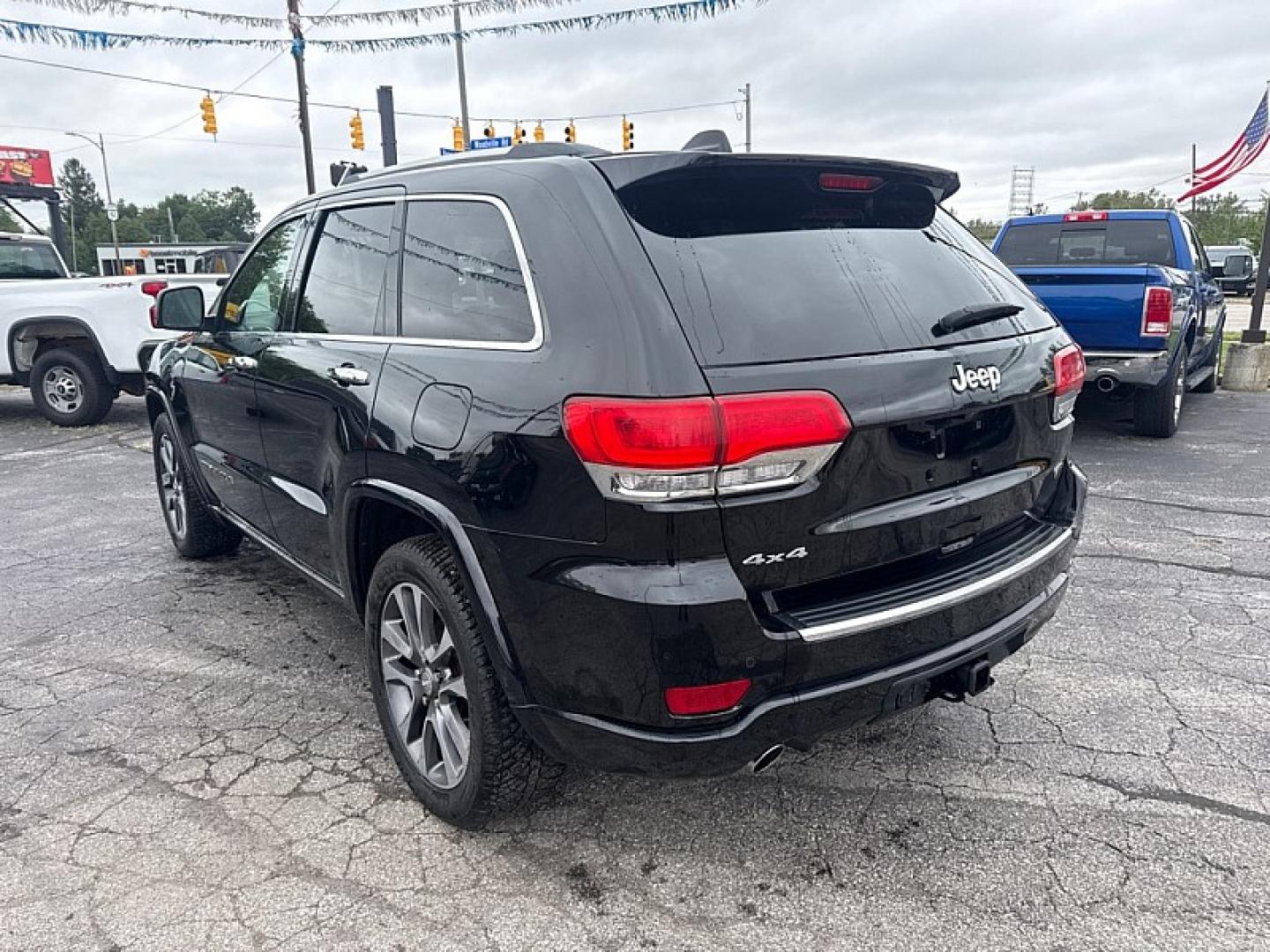 2018 BLACK /BLACK Jeep Grand Cherokee Overland 4WD (1C4RJFCG8JC) with an 3.6L V6 DOHC 24V engine, 8A transmission, located at 3304 Woodville Road, Northwood, OH, 43619, (419) 210-8019, 41.612694, -83.480743 - Your #1 Destination for Auto Loans and mdash;No Matter Your Credit!At our dealership, we believe everyone deserves the opportunity to drive their dream car and mdash;whether you have good credit, bad credit, or no credit at all. With a wide selection of hundreds of cars, trucks, and SUVs, you'll fin- Photo#2