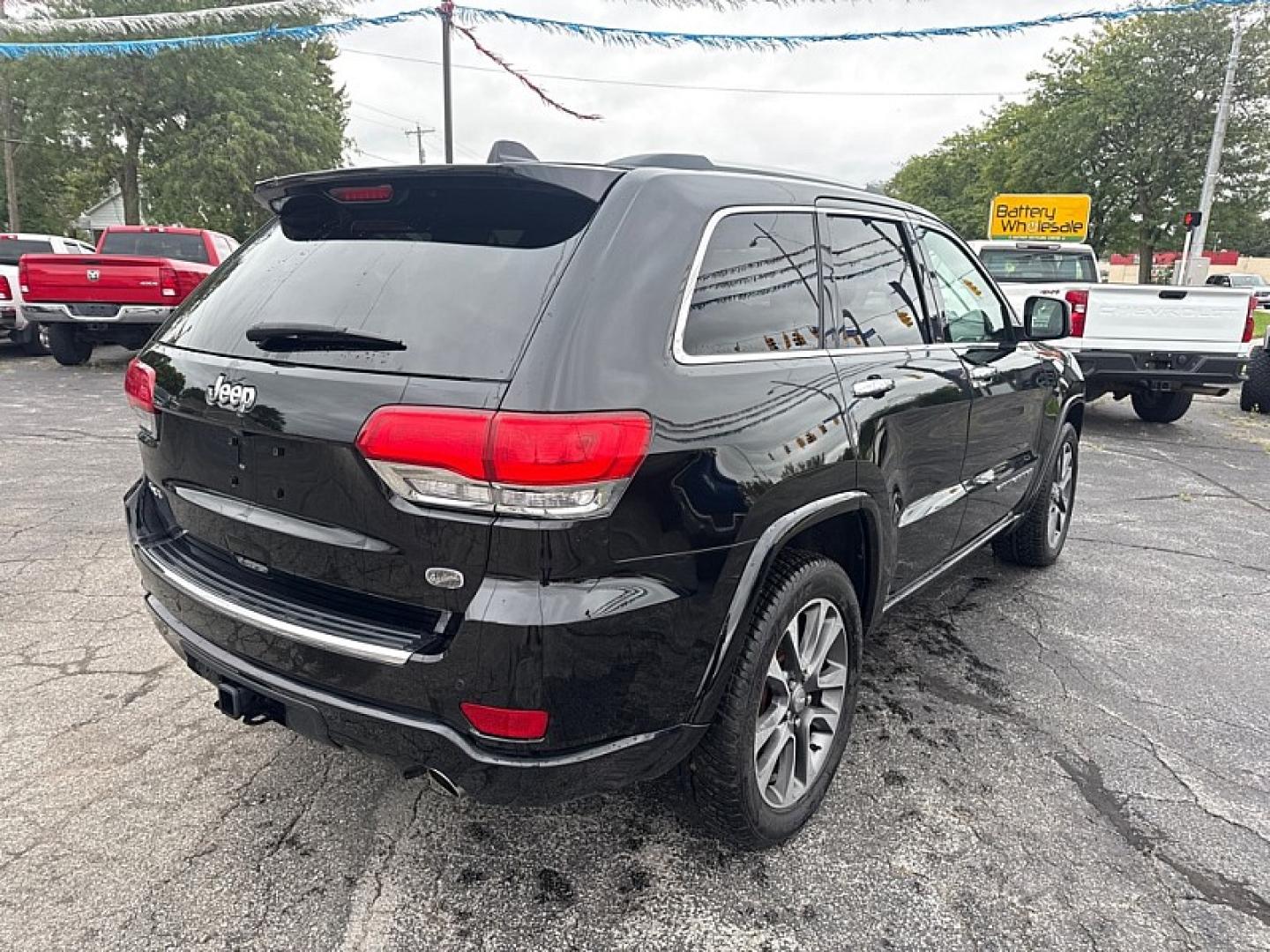 2018 BLACK /BLACK Jeep Grand Cherokee Overland 4WD (1C4RJFCG8JC) with an 3.6L V6 DOHC 24V engine, 8A transmission, located at 3304 Woodville Road, Northwood, OH, 43619, (419) 210-8019, 41.612694, -83.480743 - Your #1 Destination for Auto Loans and mdash;No Matter Your Credit!At our dealership, we believe everyone deserves the opportunity to drive their dream car and mdash;whether you have good credit, bad credit, or no credit at all. With a wide selection of hundreds of cars, trucks, and SUVs, you'll fin- Photo#4
