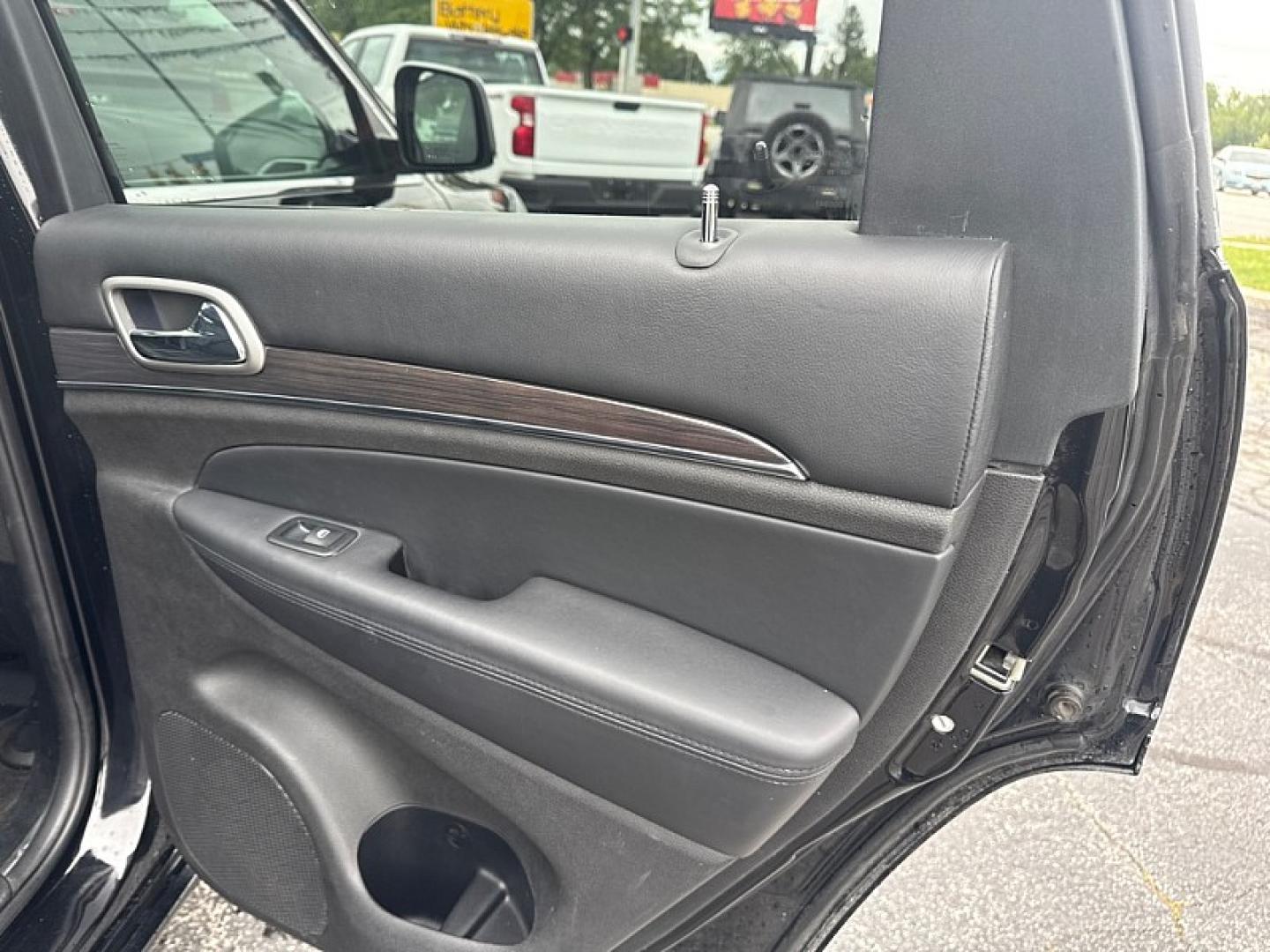 2018 BLACK /BLACK Jeep Grand Cherokee Overland 4WD (1C4RJFCG8JC) with an 3.6L V6 DOHC 24V engine, 8A transmission, located at 3304 Woodville Road, Northwood, OH, 43619, (419) 210-8019, 41.612694, -83.480743 - Your #1 Destination for Auto Loans and mdash;No Matter Your Credit!At our dealership, we believe everyone deserves the opportunity to drive their dream car and mdash;whether you have good credit, bad credit, or no credit at all. With a wide selection of hundreds of cars, trucks, and SUVs, you'll fin- Photo#12