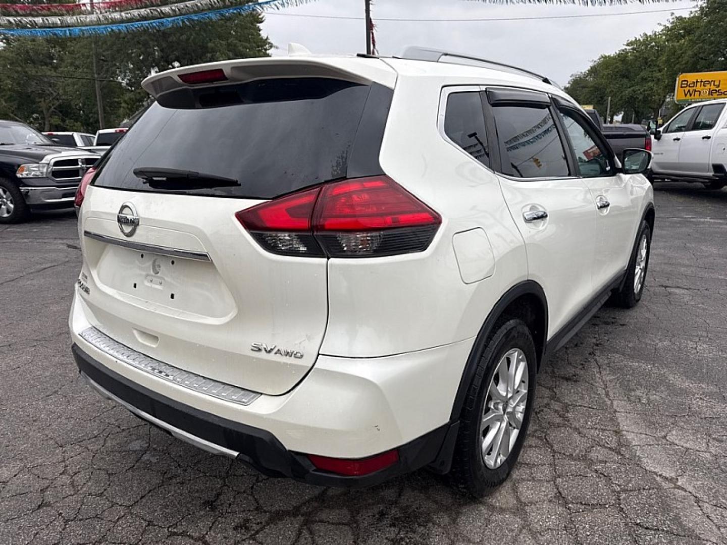 2017 WHITE /BLACK Nissan Rogue S AWD (5N1AT2MVXHC) with an 2.5L L4 DOHC 16V engine, CVT transmission, located at 3304 Woodville Road, Northwood, OH, 43619, (419) 210-8019, 41.612694, -83.480743 - Your #1 Destination for Auto Loans and mdash;No Matter Your Credit!At our dealership, we believe everyone deserves the opportunity to drive their dream car and mdash;whether you have good credit, bad credit, or no credit at all. With a wide selection of hundreds of cars, trucks, and SUVs, you'll fin- Photo#4