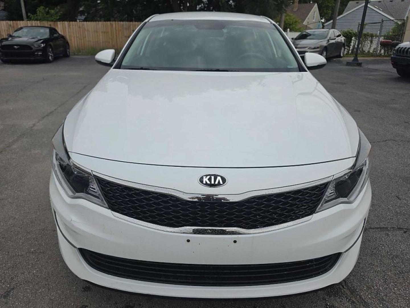 2018 WHITE /BLACK Kia Optima LX (5XXGT4L32JG) with an 2.4L L4 DOHC 16V engine, 6A transmission, located at 3304 Woodville Road, Northwood, OH, 43619, (419) 210-8019, 41.612694, -83.480743 - Your #1 Destination for Auto Loans and mdash;No Matter Your Credit!At our dealership, we believe everyone deserves the opportunity to drive their dream car and mdash;whether you have good credit, bad credit, or no credit at all. With a wide selection of hundreds of cars, trucks, and SUVs, you'll fin- Photo#7