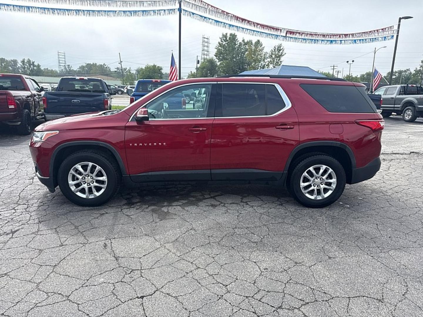 2019 RED /BLACK Chevrolet Traverse LT Cloth AWD (1GNEVGKW4KJ) with an 3.6L V6 DOHC 24V engine, 9A transmission, located at 3304 Woodville Road, Northwood, OH, 43619, (419) 210-8019, 41.612694, -83.480743 - Your #1 Destination for Auto Loans and mdash;No Matter Your Credit!At our dealership, we believe everyone deserves the opportunity to drive their dream car and mdash;whether you have good credit, bad credit, or no credit at all. With a wide selection of hundreds of cars, trucks, and SUVs, you'll fin- Photo#1