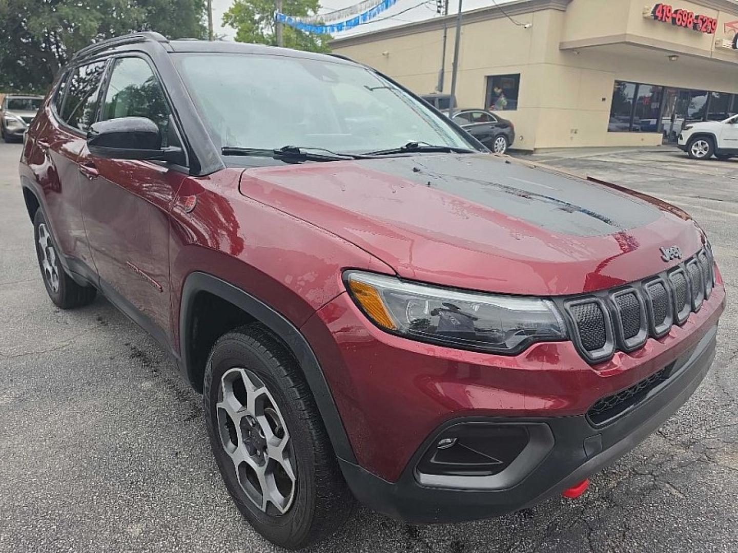 2022 RED /BLACK Jeep Compass Trailhawk 4WD (3C4NJDDB0NT) with an 2.4L L4 DOHC 16V engine, 9A transmission, located at 3304 Woodville Road, Northwood, OH, 43619, (419) 210-8019, 41.612694, -83.480743 - Your #1 Destination for Auto Loans and mdash;No Matter Your Credit!At our dealership, we believe everyone deserves the opportunity to drive their dream car and mdash;whether you have good credit, bad credit, or no credit at all. With a wide selection of hundreds of cars, trucks, and SUVs, you'll fin- Photo#6
