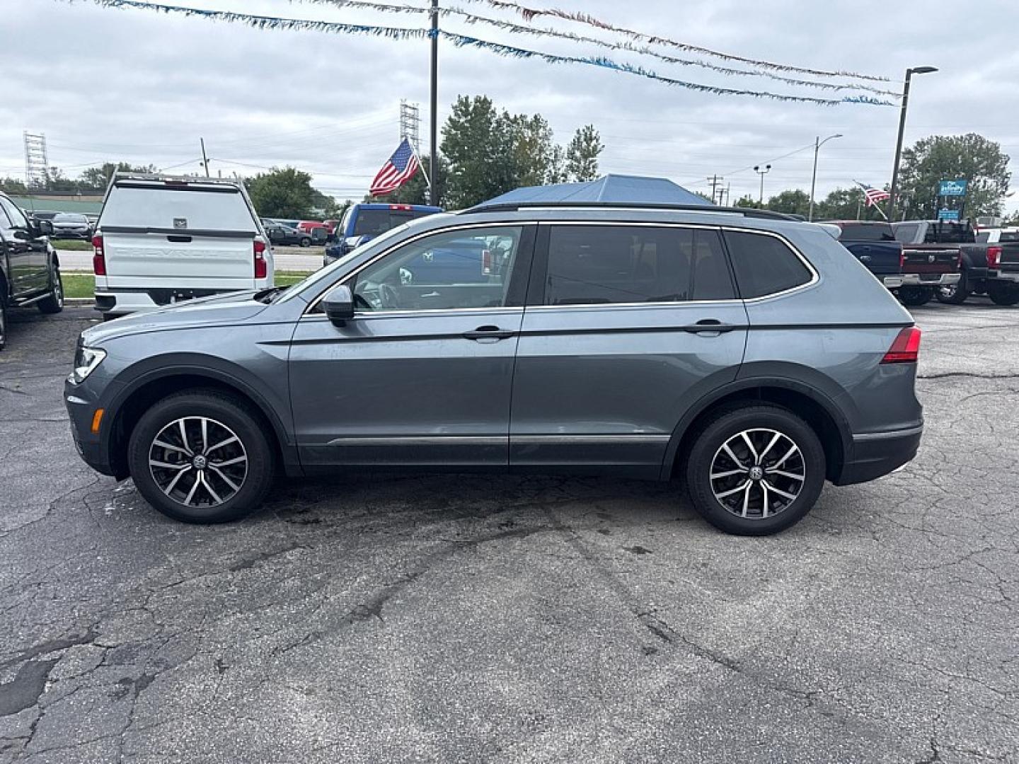 2021 SILVER /BLACK Volkswagen Tiguan SE 4Motion AWD (3VV2B7AX7MM) with an 2.0L L4 DOHC 16V TURBO engine, 8A transmission, located at 3304 Woodville Road, Northwood, OH, 43619, (419) 210-8019, 41.612694, -83.480743 - Your #1 Destination for Auto Loans and mdash;No Matter Your Credit!At our dealership, we believe everyone deserves the opportunity to drive their dream car and mdash;whether you have good credit, bad credit, or no credit at all. With a wide selection of hundreds of cars, trucks, and SUVs, you'll fin- Photo#1