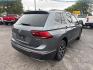 2021 SILVER /BLACK Volkswagen Tiguan SE 4Motion AWD (3VV2B7AX7MM) with an 2.0L L4 DOHC 16V TURBO engine, 8A transmission, located at 3304 Woodville Road, Northwood, OH, 43619, (419) 210-8019, 41.612694, -83.480743 - Your #1 Destination for Auto Loans and mdash;No Matter Your Credit!At our dealership, we believe everyone deserves the opportunity to drive their dream car and mdash;whether you have good credit, bad credit, or no credit at all. With a wide selection of hundreds of cars, trucks, and SUVs, you'll fin- Photo#4