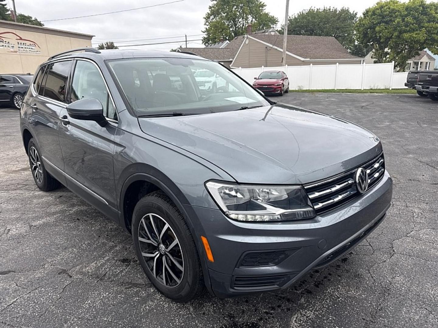 2021 SILVER /BLACK Volkswagen Tiguan SE 4Motion AWD (3VV2B7AX7MM) with an 2.0L L4 DOHC 16V TURBO engine, 8A transmission, located at 3304 Woodville Road, Northwood, OH, 43619, (419) 210-8019, 41.612694, -83.480743 - Your #1 Destination for Auto Loans and mdash;No Matter Your Credit!At our dealership, we believe everyone deserves the opportunity to drive their dream car and mdash;whether you have good credit, bad credit, or no credit at all. With a wide selection of hundreds of cars, trucks, and SUVs, you'll fin- Photo#6