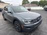 2021 SILVER /BLACK Volkswagen Tiguan SE 4Motion AWD (3VV2B7AX7MM) with an 2.0L L4 DOHC 16V TURBO engine, 8A transmission, located at 3304 Woodville Road, Northwood, OH, 43619, (419) 210-8019, 41.612694, -83.480743 - Your #1 Destination for Auto Loans and mdash;No Matter Your Credit!At our dealership, we believe everyone deserves the opportunity to drive their dream car and mdash;whether you have good credit, bad credit, or no credit at all. With a wide selection of hundreds of cars, trucks, and SUVs, you'll fin- Photo#6