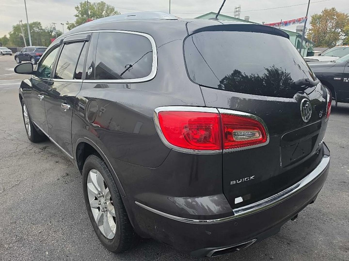 2013 GRAY /BLACK Buick Enclave Premium AWD (5GAKVDKD0DJ) with an 3.6L V6 DOHC 24V engine, 6-Speed Automatic Overdrive transmission, located at 3304 Woodville Road, Northwood, OH, 43619, (419) 210-8019, 41.612694, -83.480743- Photo#0