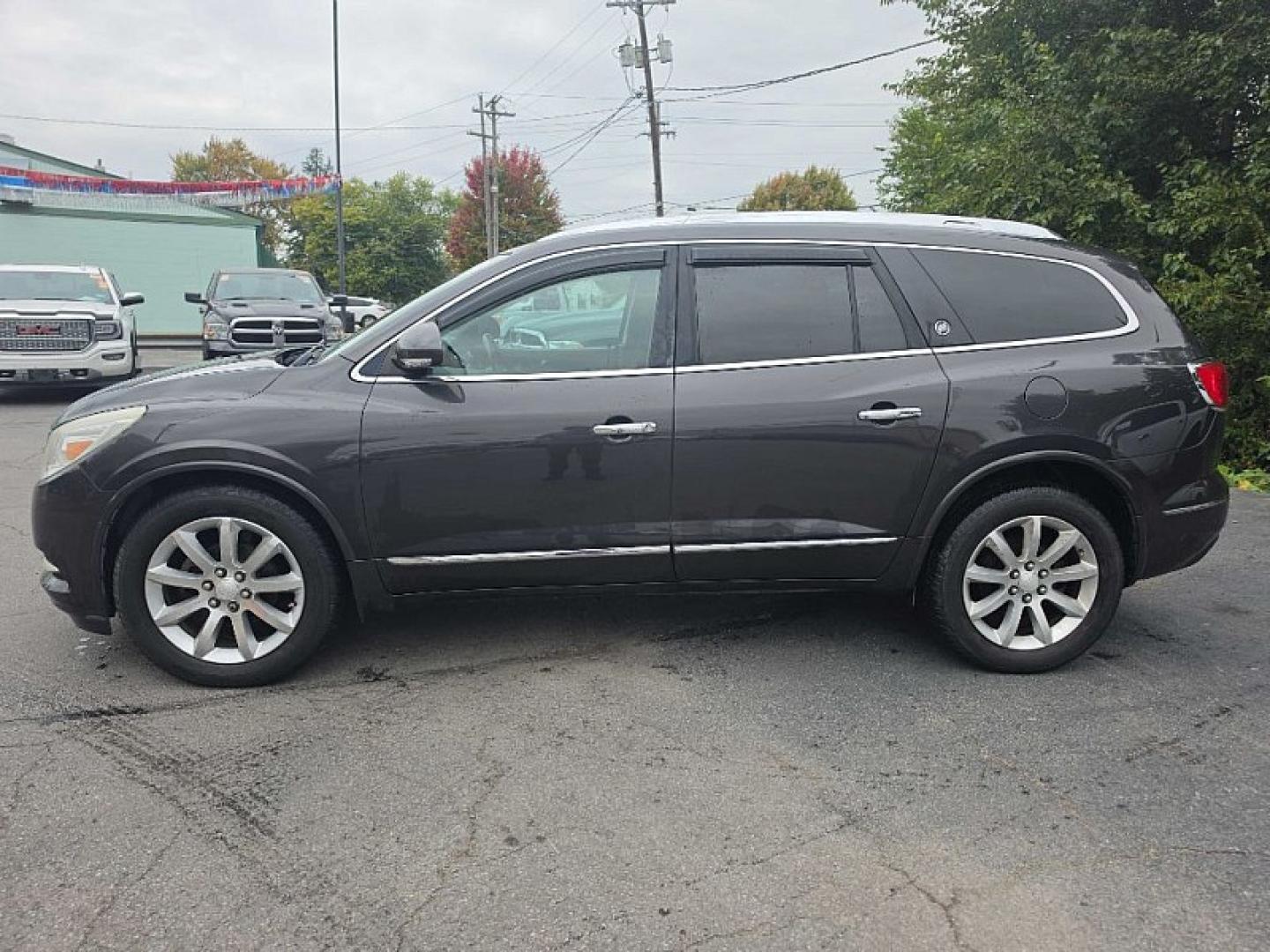 2013 GRAY /BLACK Buick Enclave Premium AWD (5GAKVDKD0DJ) with an 3.6L V6 DOHC 24V engine, 6-Speed Automatic Overdrive transmission, located at 3304 Woodville Road, Northwood, OH, 43619, (419) 210-8019, 41.612694, -83.480743- Photo#1
