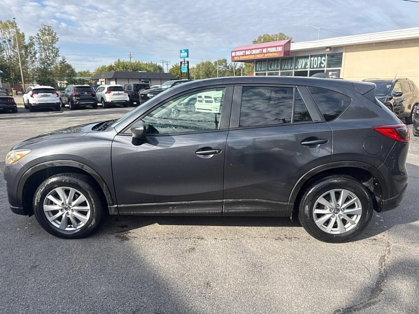 2015 BLACK /BLACK Mazda CX-5 Sport AWD (JM3KE4BE1F0) with an 2.5L L4 DOHC 16V engine, 6A transmission, located at 3304 Woodville Road, Northwood, OH, 43619, (419) 210-8019, 41.612694, -83.480743 - Your #1 Destination for Auto Loans and mdash;No Matter Your Credit!At our dealership, we believe everyone deserves the opportunity to drive their dream car and mdash;whether you have good credit, bad credit, or no credit at all. With a wide selection of hundreds of cars, trucks, and SUVs, you'll fin- Photo#1