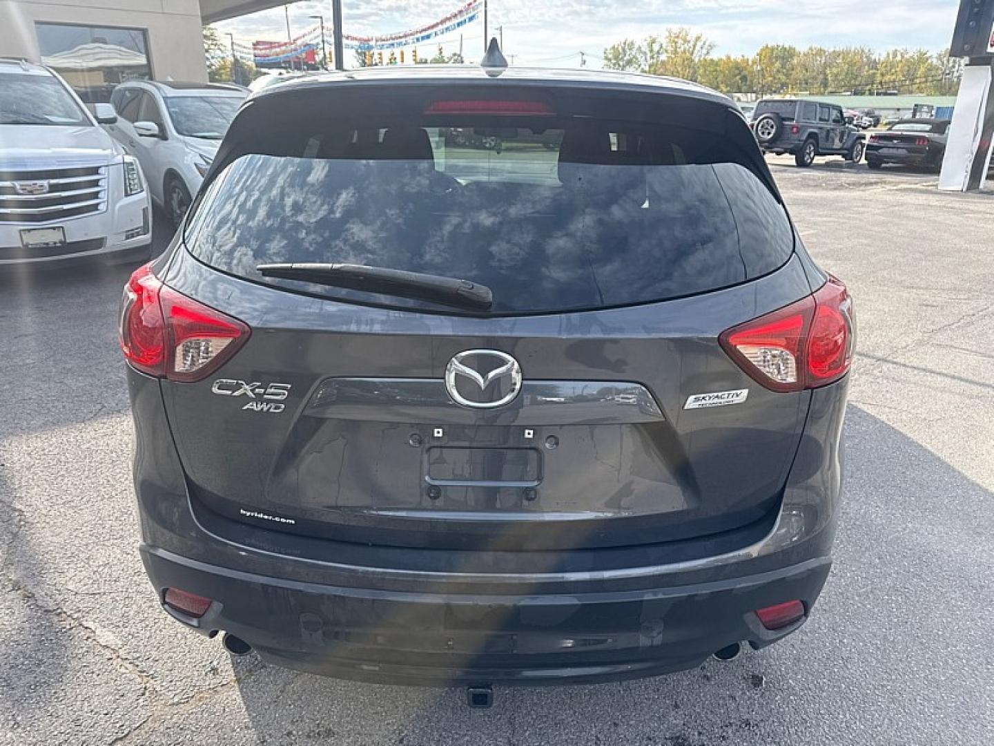 2015 BLACK /BLACK Mazda CX-5 Sport AWD (JM3KE4BE1F0) with an 2.5L L4 DOHC 16V engine, 6A transmission, located at 3304 Woodville Road, Northwood, OH, 43619, (419) 210-8019, 41.612694, -83.480743 - Your #1 Destination for Auto Loans and mdash;No Matter Your Credit!At our dealership, we believe everyone deserves the opportunity to drive their dream car and mdash;whether you have good credit, bad credit, or no credit at all. With a wide selection of hundreds of cars, trucks, and SUVs, you'll fin- Photo#3