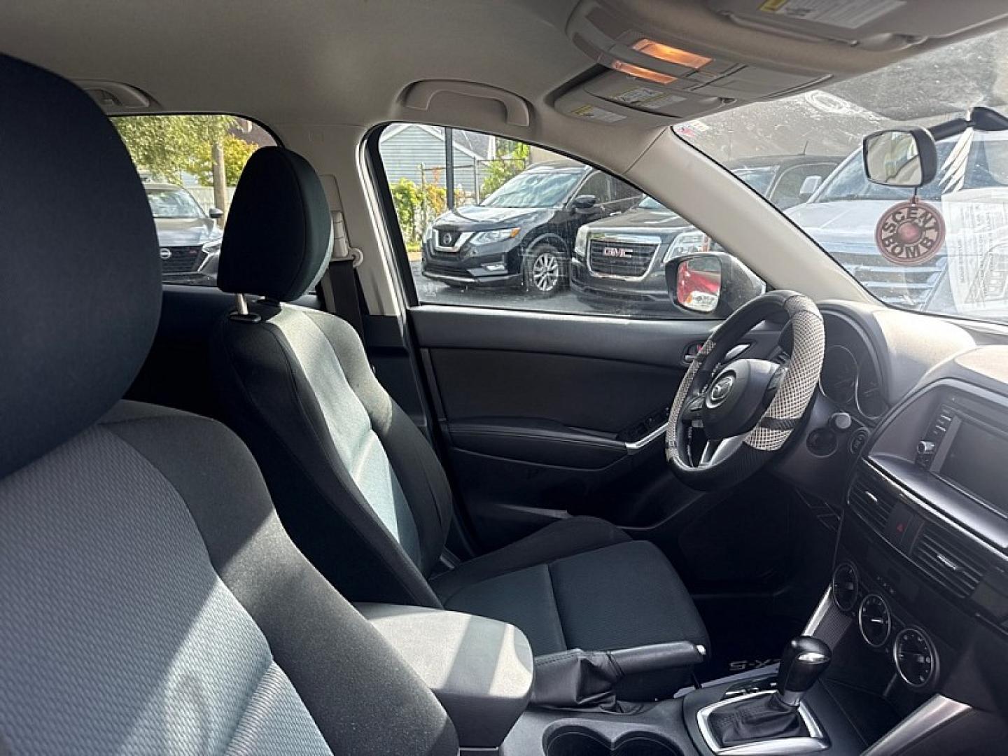 2015 BLACK /BLACK Mazda CX-5 Sport AWD (JM3KE4BE1F0) with an 2.5L L4 DOHC 16V engine, 6A transmission, located at 3304 Woodville Road, Northwood, OH, 43619, (419) 210-8019, 41.612694, -83.480743 - Your #1 Destination for Auto Loans and mdash;No Matter Your Credit!At our dealership, we believe everyone deserves the opportunity to drive their dream car and mdash;whether you have good credit, bad credit, or no credit at all. With a wide selection of hundreds of cars, trucks, and SUVs, you'll fin- Photo#15