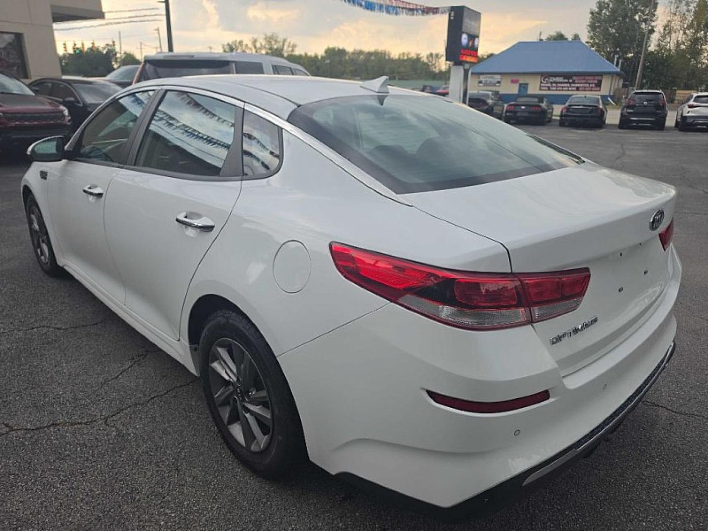 2020 WHITE /BLACK Kia Optima LX (5XXGT4L35LG) with an 2.4L L4 DOHC 16V engine, 6A transmission, located at 3304 Woodville Road, Northwood, OH, 43619, (419) 210-8019, 41.612694, -83.480743 - Your #1 Destination for Auto Loans and mdash;No Matter Your Credit!At our dealership, we believe everyone deserves the opportunity to drive their dream car and mdash;whether you have good credit, bad credit, or no credit at all. With a wide selection of hundreds of cars, trucks, and SUVs, you'll fin- Photo#2