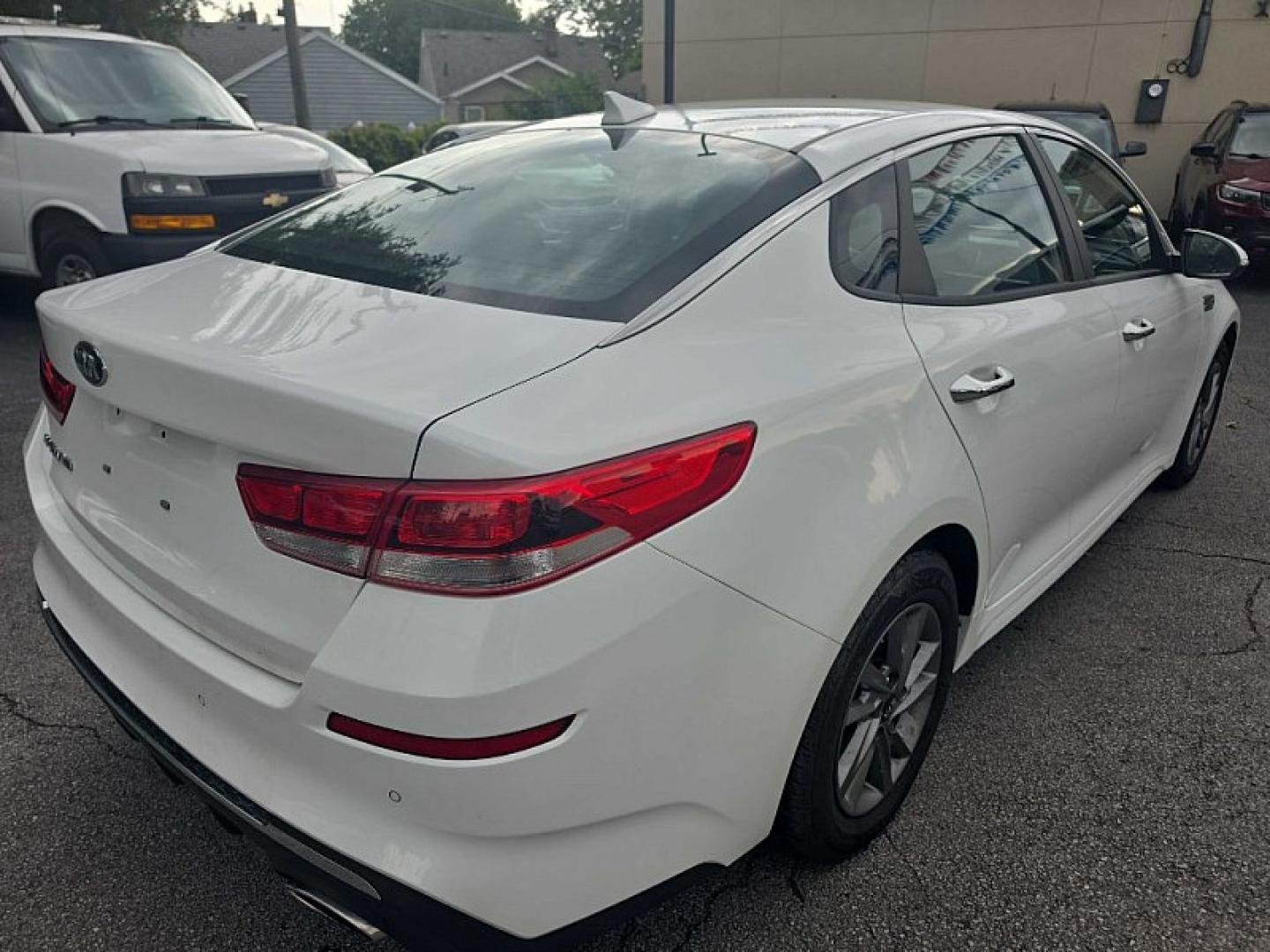 2020 WHITE /BLACK Kia Optima LX (5XXGT4L35LG) with an 2.4L L4 DOHC 16V engine, 6A transmission, located at 3304 Woodville Road, Northwood, OH, 43619, (419) 210-8019, 41.612694, -83.480743 - Your #1 Destination for Auto Loans and mdash;No Matter Your Credit!At our dealership, we believe everyone deserves the opportunity to drive their dream car and mdash;whether you have good credit, bad credit, or no credit at all. With a wide selection of hundreds of cars, trucks, and SUVs, you'll fin- Photo#4