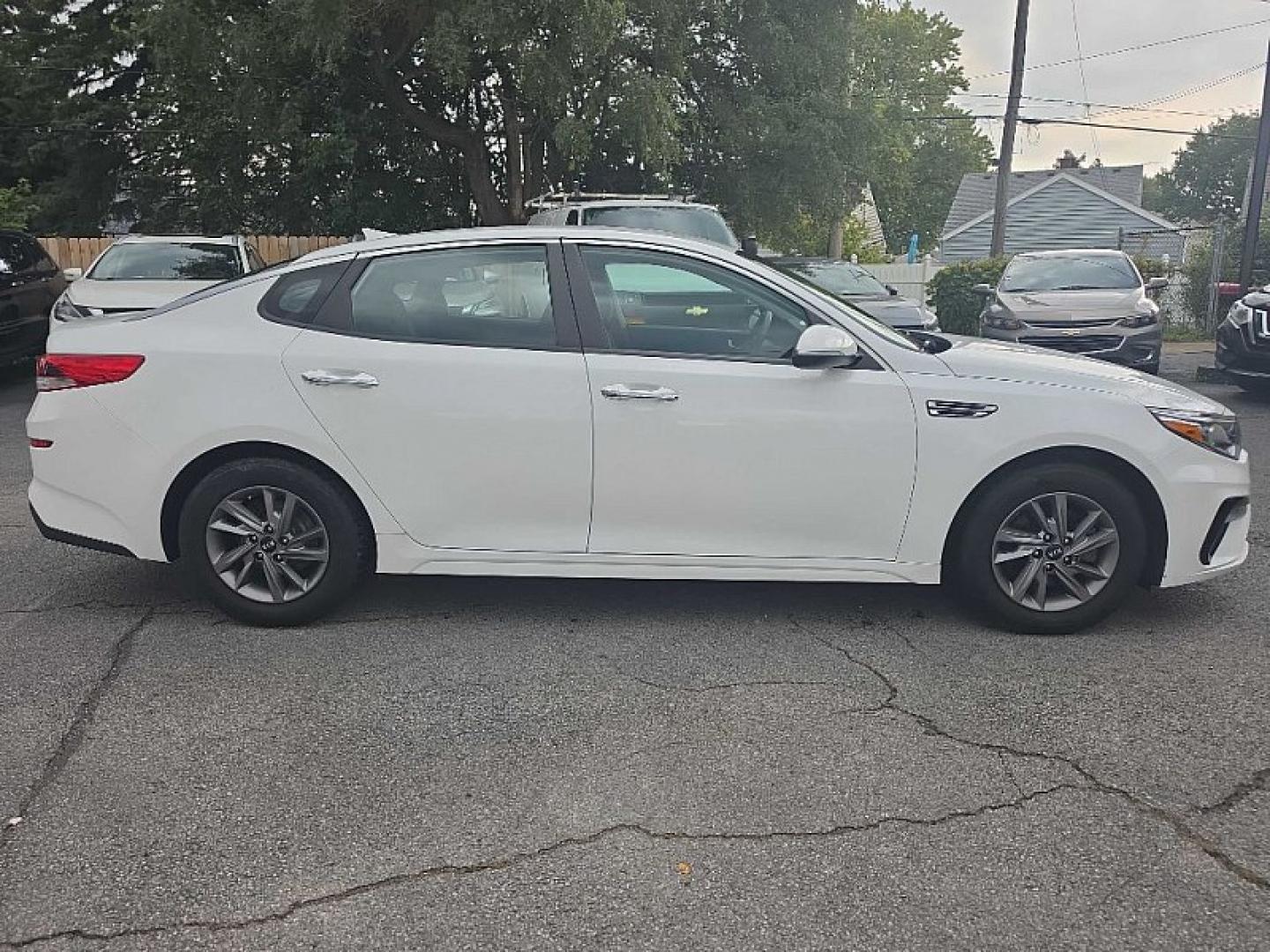 2020 WHITE /BLACK Kia Optima LX (5XXGT4L35LG) with an 2.4L L4 DOHC 16V engine, 6A transmission, located at 3304 Woodville Road, Northwood, OH, 43619, (419) 210-8019, 41.612694, -83.480743 - Your #1 Destination for Auto Loans and mdash;No Matter Your Credit!At our dealership, we believe everyone deserves the opportunity to drive their dream car and mdash;whether you have good credit, bad credit, or no credit at all. With a wide selection of hundreds of cars, trucks, and SUVs, you'll fin- Photo#5