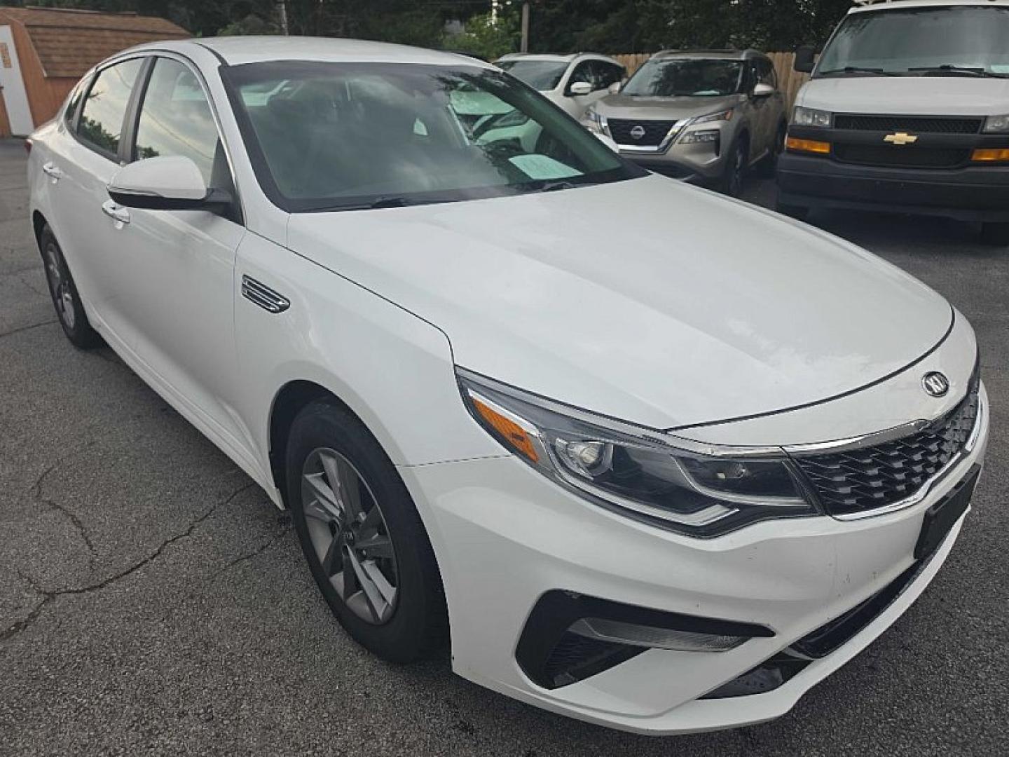 2020 WHITE /BLACK Kia Optima LX (5XXGT4L35LG) with an 2.4L L4 DOHC 16V engine, 6A transmission, located at 3304 Woodville Road, Northwood, OH, 43619, (419) 210-8019, 41.612694, -83.480743 - Your #1 Destination for Auto Loans and mdash;No Matter Your Credit!At our dealership, we believe everyone deserves the opportunity to drive their dream car and mdash;whether you have good credit, bad credit, or no credit at all. With a wide selection of hundreds of cars, trucks, and SUVs, you'll fin- Photo#6