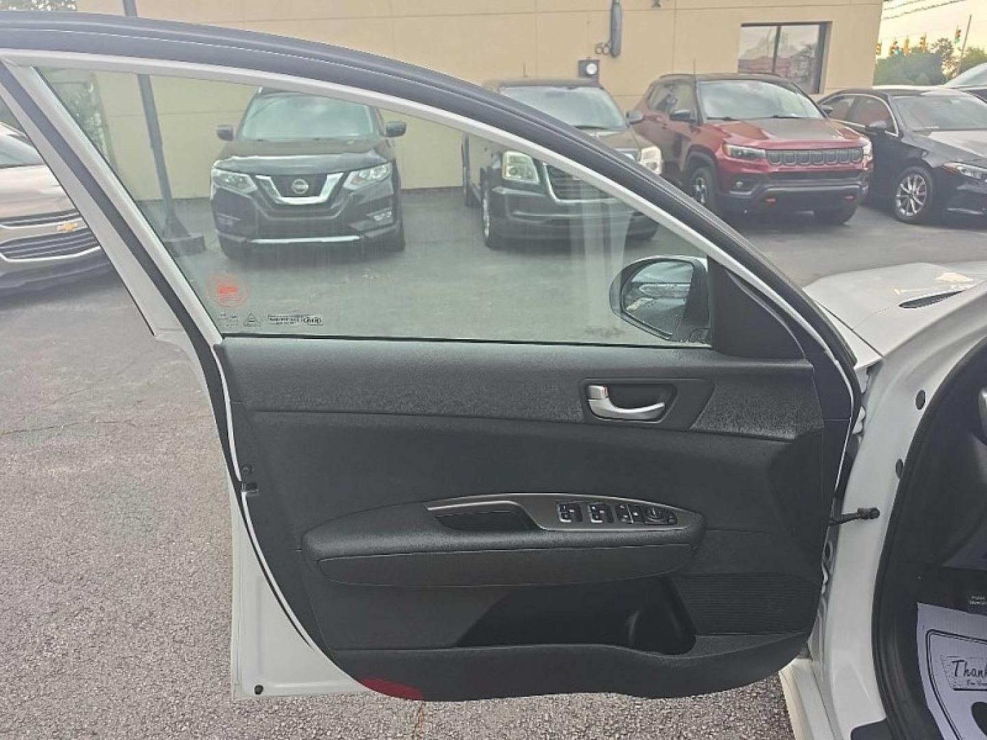 2020 WHITE /BLACK Kia Optima LX (5XXGT4L35LG) with an 2.4L L4 DOHC 16V engine, 6A transmission, located at 3304 Woodville Road, Northwood, OH, 43619, (419) 210-8019, 41.612694, -83.480743 - Your #1 Destination for Auto Loans and mdash;No Matter Your Credit!At our dealership, we believe everyone deserves the opportunity to drive their dream car and mdash;whether you have good credit, bad credit, or no credit at all. With a wide selection of hundreds of cars, trucks, and SUVs, you'll fin- Photo#8