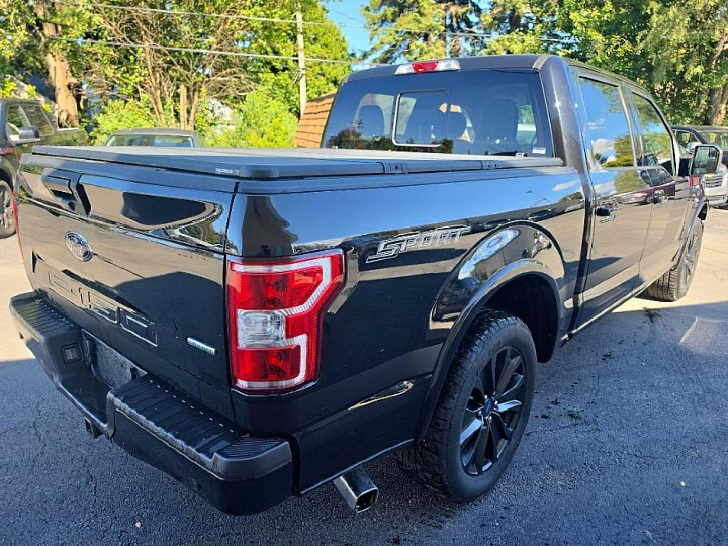 2019 BLACK /BLACK Ford F-150 Lariat SuperCrew 5.5-ft. Bed 2WD (1FTEW1CP1KF) with an 2.7L V6 DOHC 24V engine, 6A transmission, located at 3304 Woodville Road, Northwood, OH, 43619, (419) 210-8019, 41.612694, -83.480743 - Your #1 Destination for Auto Loans and mdash;No Matter Your Credit!At our dealership, we believe everyone deserves the opportunity to drive their dream car and mdash;whether you have good credit, bad credit, or no credit at all. With a wide selection of hundreds of cars, trucks, and SUVs, you'll fin- Photo#4