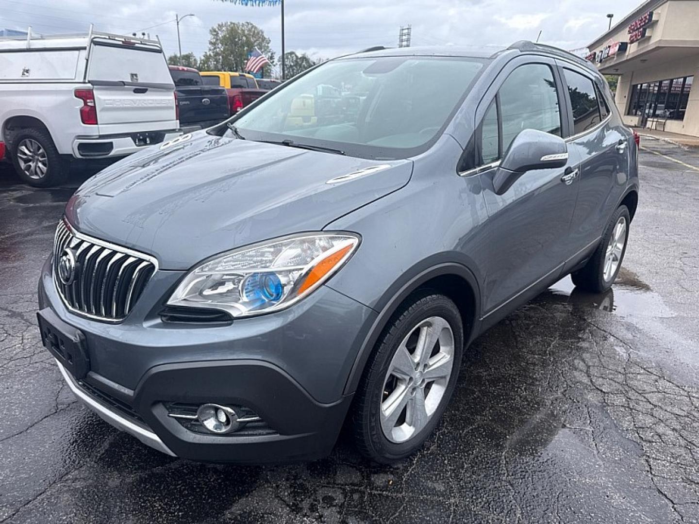 2015 GRAY /BLACK Buick Encore Convenience AWD (KL4CJFSB1FB) with an 1.4L L4 DOHC 16V TURBO engine, 6A transmission, located at 3304 Woodville Road, Northwood, OH, 43619, (419) 210-8019, 41.612694, -83.480743- Photo#0