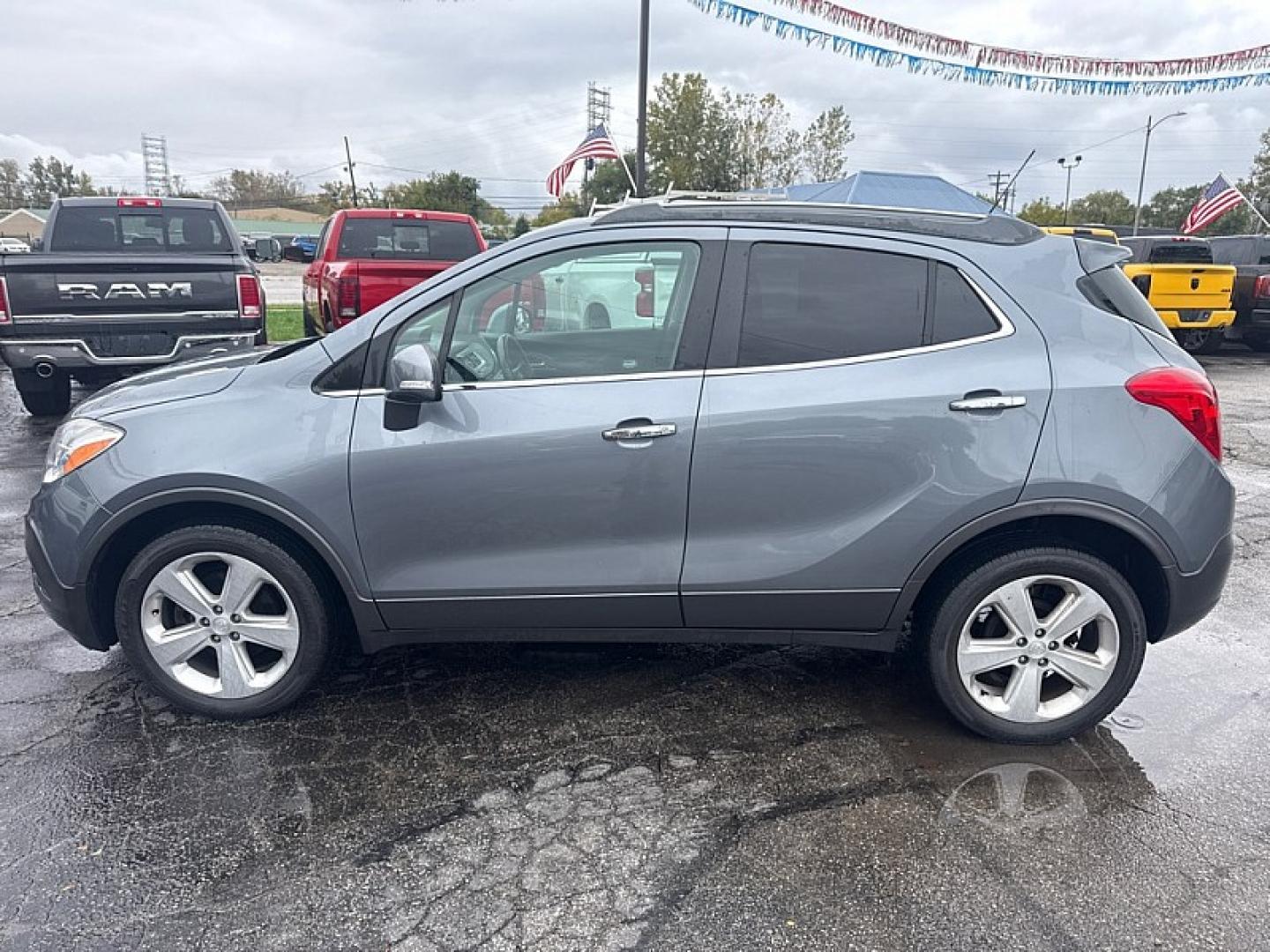 2015 GRAY /BLACK Buick Encore Convenience AWD (KL4CJFSB1FB) with an 1.4L L4 DOHC 16V TURBO engine, 6A transmission, located at 3304 Woodville Road, Northwood, OH, 43619, (419) 210-8019, 41.612694, -83.480743- Photo#1