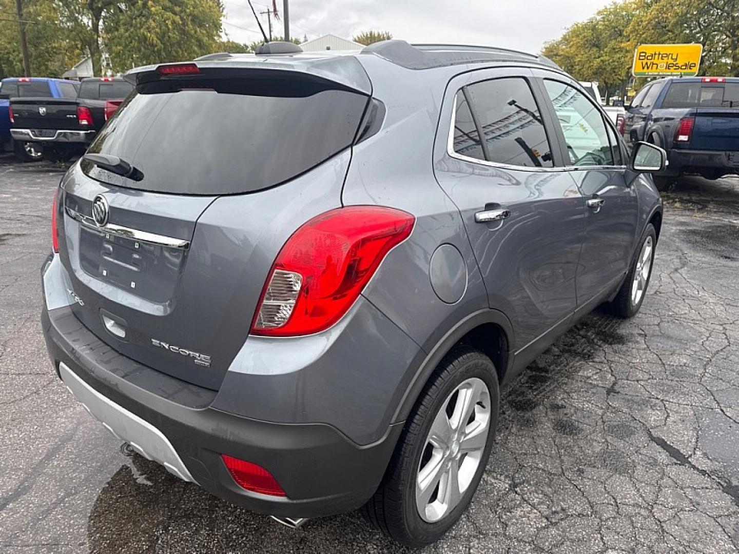 2015 GRAY /BLACK Buick Encore Convenience AWD (KL4CJFSB1FB) with an 1.4L L4 DOHC 16V TURBO engine, 6A transmission, located at 3304 Woodville Road, Northwood, OH, 43619, (419) 210-8019, 41.612694, -83.480743- Photo#4