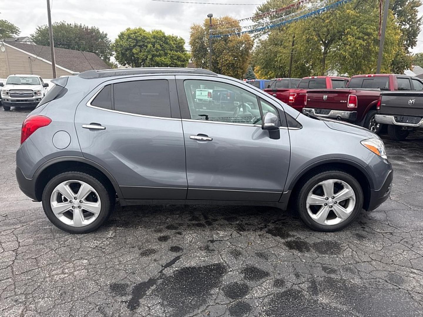 2015 GRAY /BLACK Buick Encore Convenience AWD (KL4CJFSB1FB) with an 1.4L L4 DOHC 16V TURBO engine, 6A transmission, located at 3304 Woodville Road, Northwood, OH, 43619, (419) 210-8019, 41.612694, -83.480743- Photo#5