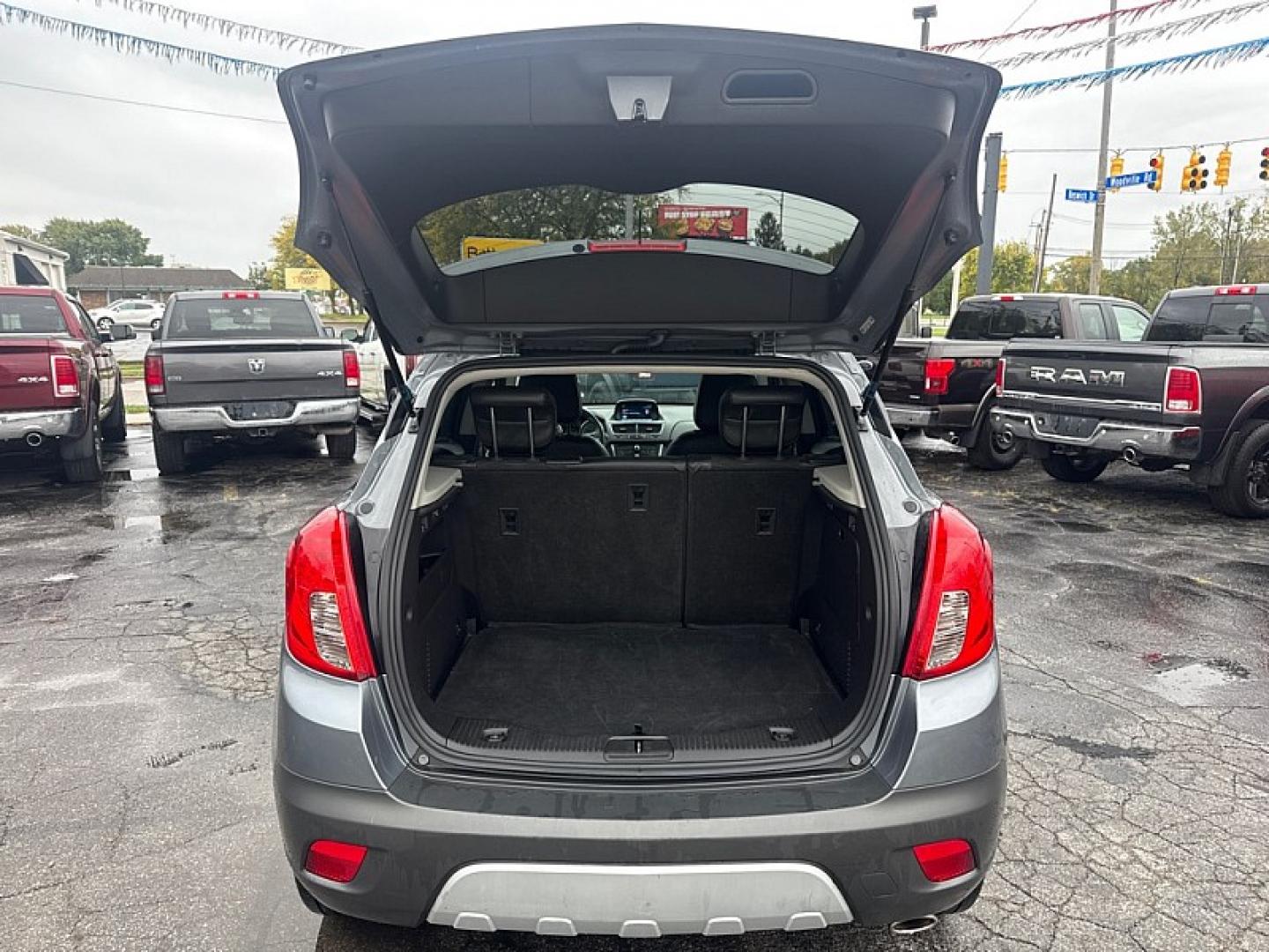 2015 GRAY /BLACK Buick Encore Convenience AWD (KL4CJFSB1FB) with an 1.4L L4 DOHC 16V TURBO engine, 6A transmission, located at 3304 Woodville Road, Northwood, OH, 43619, (419) 210-8019, 41.612694, -83.480743- Photo#16