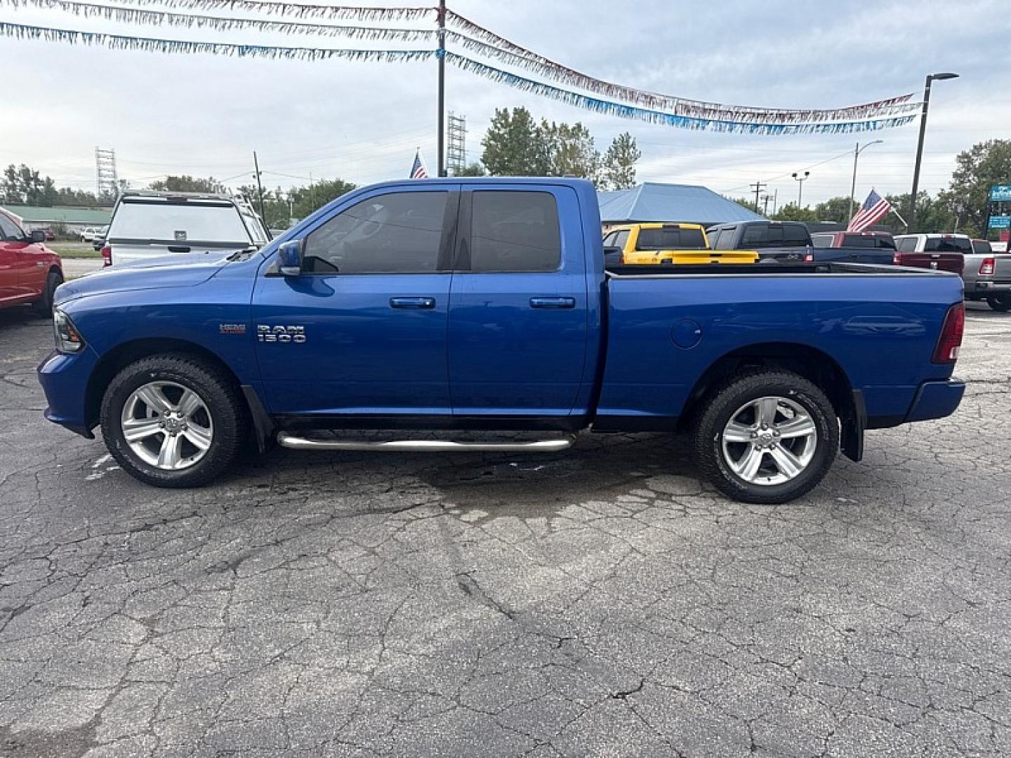 2015 BLUE /BLACK Ram 1500 Sport Quad Cab 4WD (1C6RR7HT4FS) with an 5.7L V8 OHV 16V engine, 6A transmission, located at 3304 Woodville Road, Northwood, OH, 43619, (419) 210-8019, 41.612694, -83.480743 - Your #1 Destination for Auto Loans and mdash;No Matter Your Credit!At our dealership, we believe everyone deserves the opportunity to drive their dream car and mdash;whether you have good credit, bad credit, or no credit at all. With a wide selection of hundreds of cars, trucks, and SUVs, you'll fin- Photo#1
