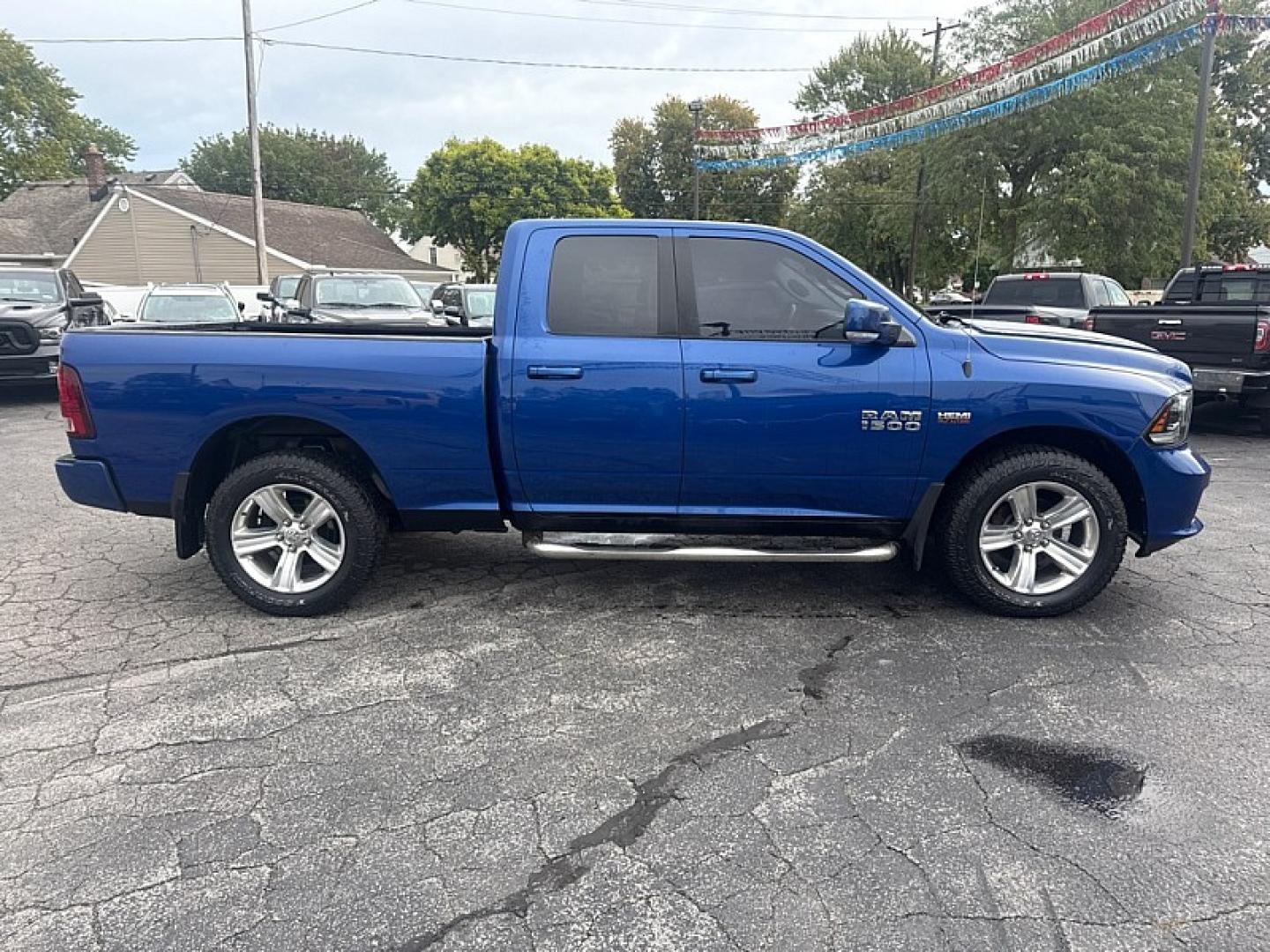 2015 BLUE /BLACK Ram 1500 Sport Quad Cab 4WD (1C6RR7HT4FS) with an 5.7L V8 OHV 16V engine, 6A transmission, located at 3304 Woodville Road, Northwood, OH, 43619, (419) 210-8019, 41.612694, -83.480743 - Your #1 Destination for Auto Loans and mdash;No Matter Your Credit!At our dealership, we believe everyone deserves the opportunity to drive their dream car and mdash;whether you have good credit, bad credit, or no credit at all. With a wide selection of hundreds of cars, trucks, and SUVs, you'll fin- Photo#5