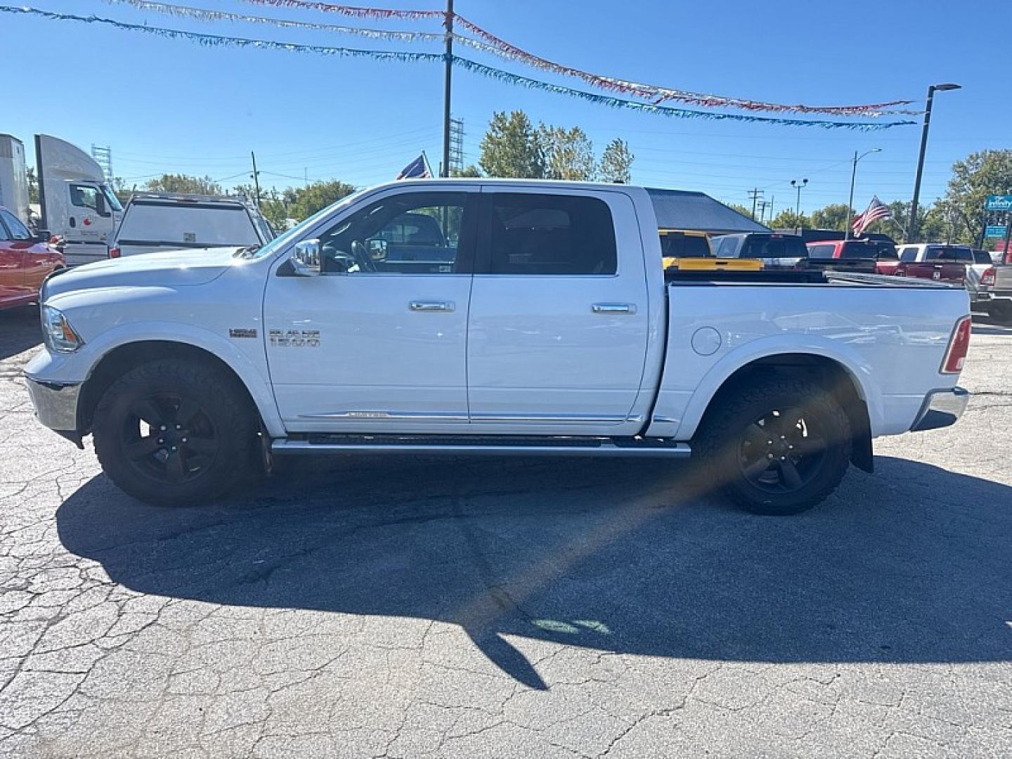 2016 WHITE /BLACK RAM 1500 Longhorn Crew Cab SWB 4WD (1C6RR7PT4GS) with an 5.7L V8 OHV 16V engine, 6A transmission, located at 3304 Woodville Road, Northwood, OH, 43619, (419) 210-8019, 41.612694, -83.480743 - Your #1 Destination for Auto Loans and mdash;No Matter Your Credit!At our dealership, we believe everyone deserves the opportunity to drive their dream car and mdash;whether you have good credit, bad credit, or no credit at all. With a wide selection of hundreds of cars, trucks, and SUVs, you'll fin- Photo#1