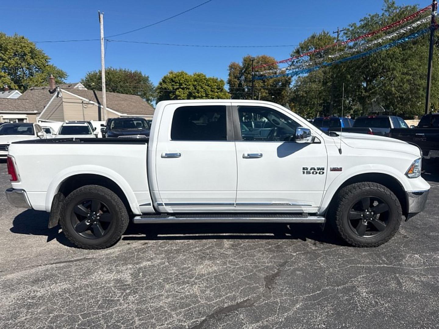 2016 WHITE /BLACK RAM 1500 Longhorn Crew Cab SWB 4WD (1C6RR7PT4GS) with an 5.7L V8 OHV 16V engine, 6A transmission, located at 3304 Woodville Road, Northwood, OH, 43619, (419) 210-8019, 41.612694, -83.480743 - Your #1 Destination for Auto Loans and mdash;No Matter Your Credit!At our dealership, we believe everyone deserves the opportunity to drive their dream car and mdash;whether you have good credit, bad credit, or no credit at all. With a wide selection of hundreds of cars, trucks, and SUVs, you'll fin- Photo#5