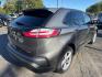2022 GRAY /BLACK Ford Edge SE AWD (2FMPK4G92NB) with an 2.0L L4 DOHC 16V engine, 6A transmission, located at 3304 Woodville Road, Northwood, OH, 43619, (419) 210-8019, 41.612694, -83.480743 - Your #1 Destination for Auto Loans and mdash;No Matter Your Credit!At our dealership, we believe everyone deserves the opportunity to drive their dream car and mdash;whether you have good credit, bad credit, or no credit at all. With a wide selection of hundreds of cars, trucks, and SUVs, you'll fin- Photo#4