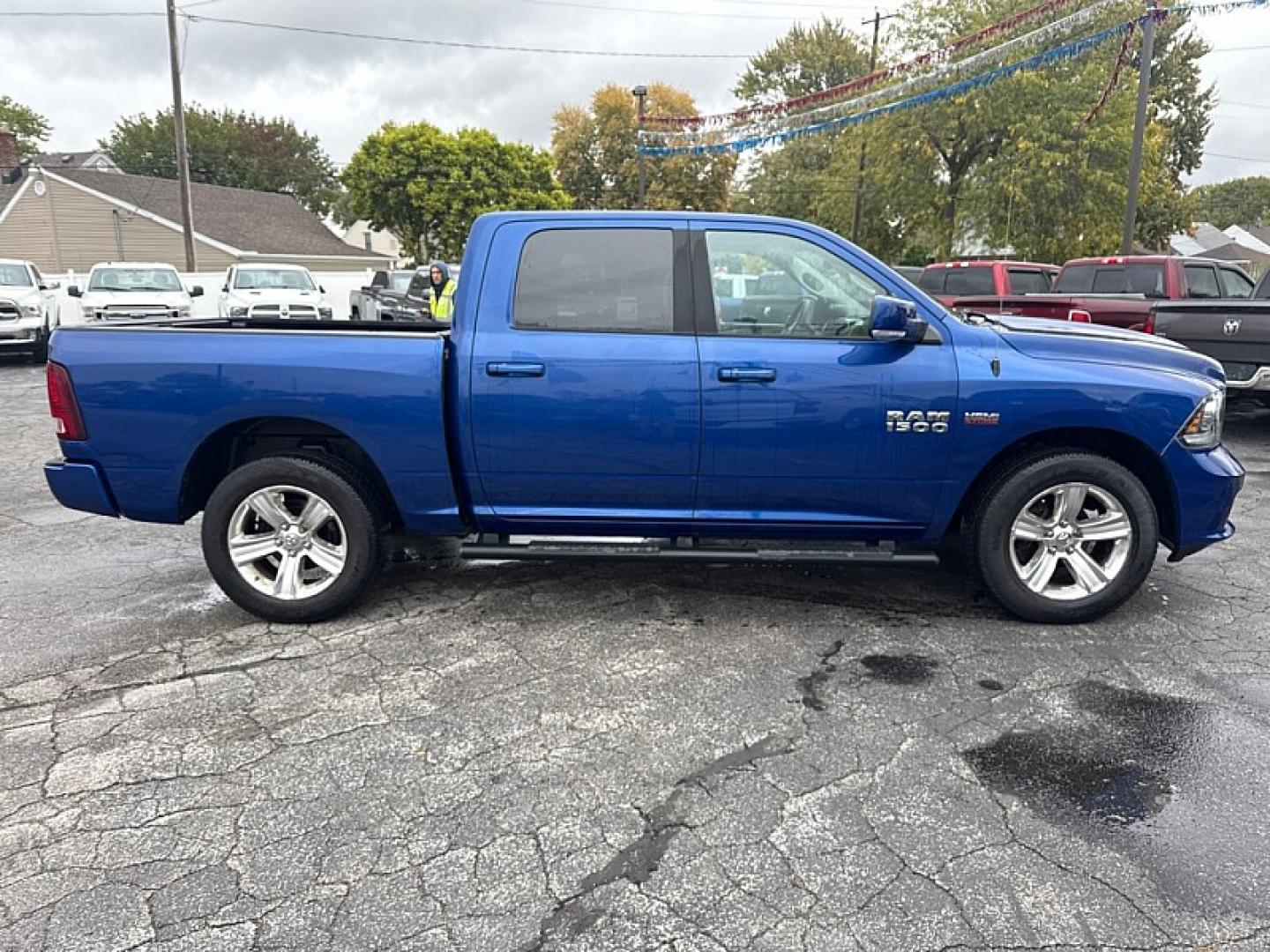 2014 BLUE /BLACK Ram 1500 Sport Crew Cab SWB 4WD (1C6RR7MTXES) with an 5.7L V8 OHV 16V engine, 6-Speed Automatic transmission, located at 3304 Woodville Road, Northwood, OH, 43619, (419) 210-8019, 41.612694, -83.480743 - Your #1 Destination for Auto Loans and mdash;No Matter Your Credit!At our dealership, we believe everyone deserves the opportunity to drive their dream car and mdash;whether you have good credit, bad credit, or no credit at all. With a wide selection of hundreds of cars, trucks, and SUVs, you'll fin- Photo#5
