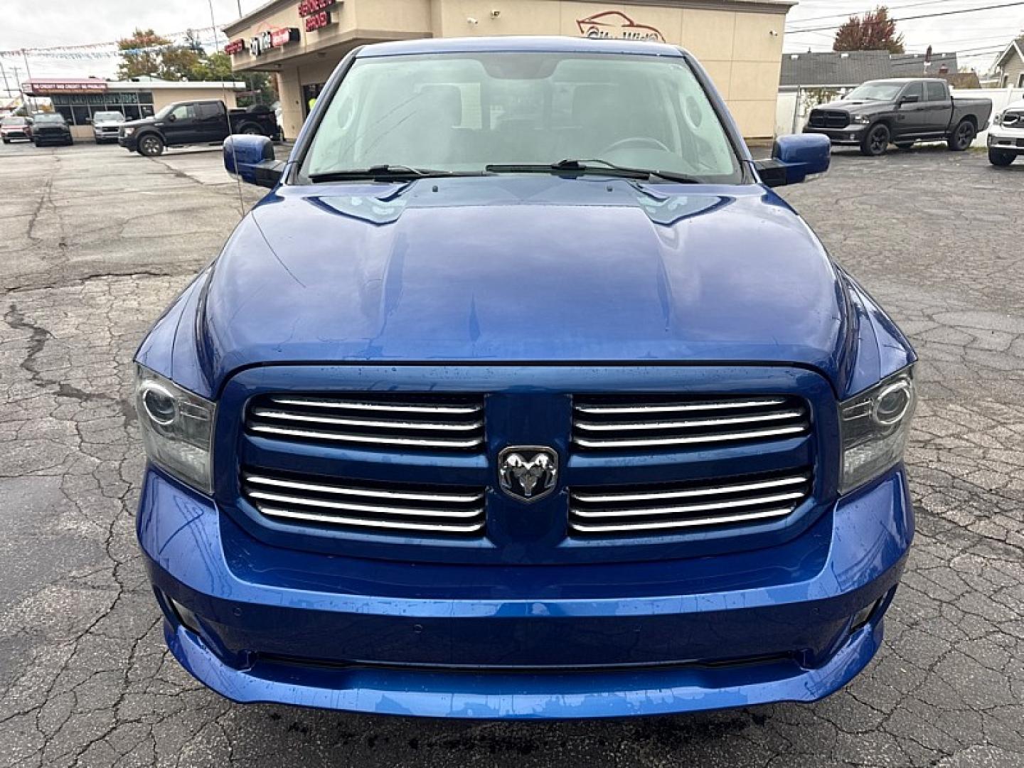 2014 BLUE /BLACK Ram 1500 Sport Crew Cab SWB 4WD (1C6RR7MTXES) with an 5.7L V8 OHV 16V engine, 6-Speed Automatic transmission, located at 3304 Woodville Road, Northwood, OH, 43619, (419) 210-8019, 41.612694, -83.480743 - Your #1 Destination for Auto Loans and mdash;No Matter Your Credit!At our dealership, we believe everyone deserves the opportunity to drive their dream car and mdash;whether you have good credit, bad credit, or no credit at all. With a wide selection of hundreds of cars, trucks, and SUVs, you'll fin- Photo#7