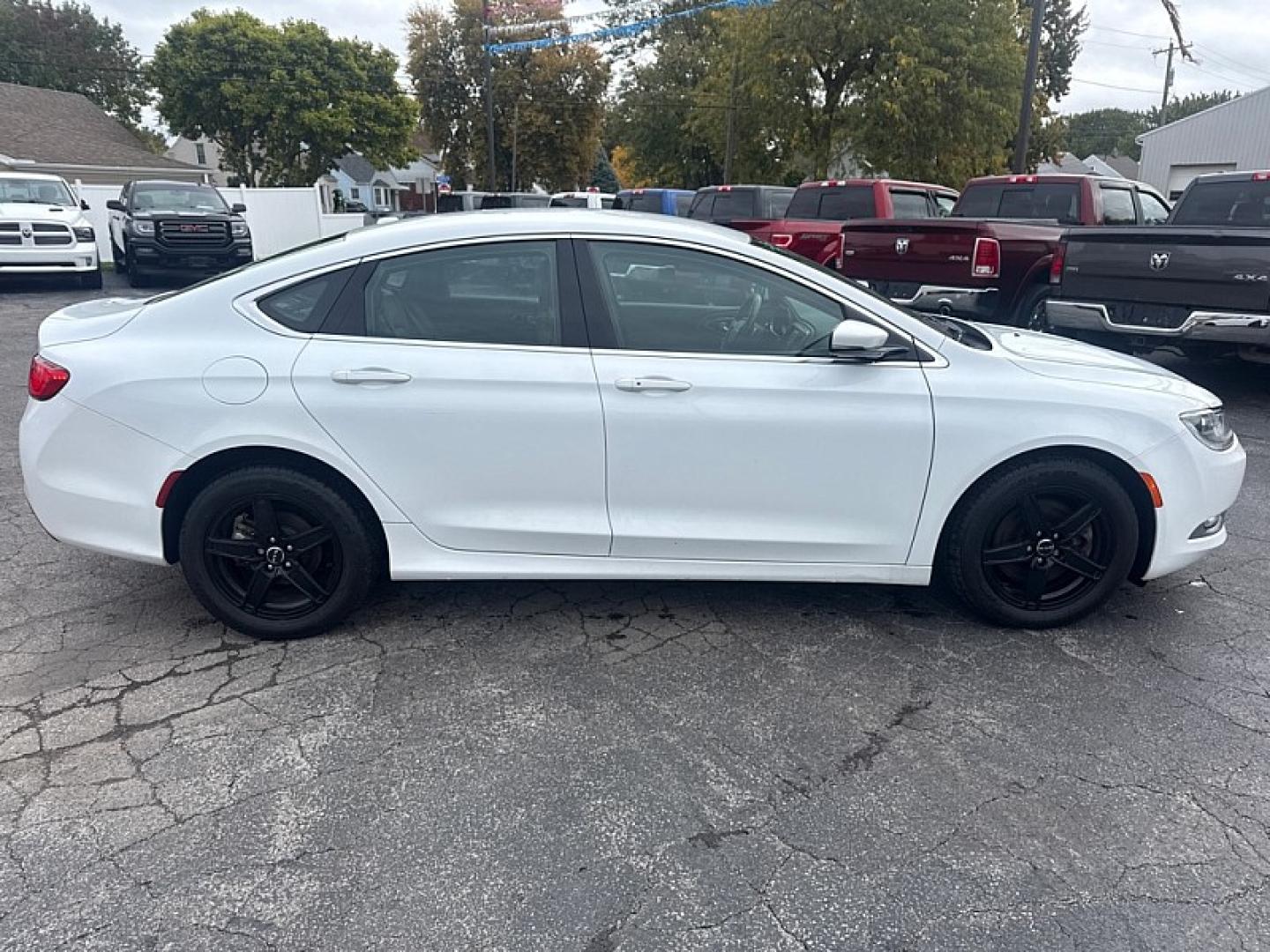 2016 WHITE /BROWN Chrysler 200 C (1C3CCCCG5GN) with an 3.6L V6 DOHC 24V FFV engine, 9A transmission, located at 3304 Woodville Road, Northwood, OH, 43619, (419) 210-8019, 41.612694, -83.480743 - Your #1 Destination for Auto Loans and mdash;No Matter Your Credit!At our dealership, we believe everyone deserves the opportunity to drive their dream car and mdash;whether you have good credit, bad credit, or no credit at all. With a wide selection of hundreds of cars, trucks, and SUVs, you'll fin- Photo#5