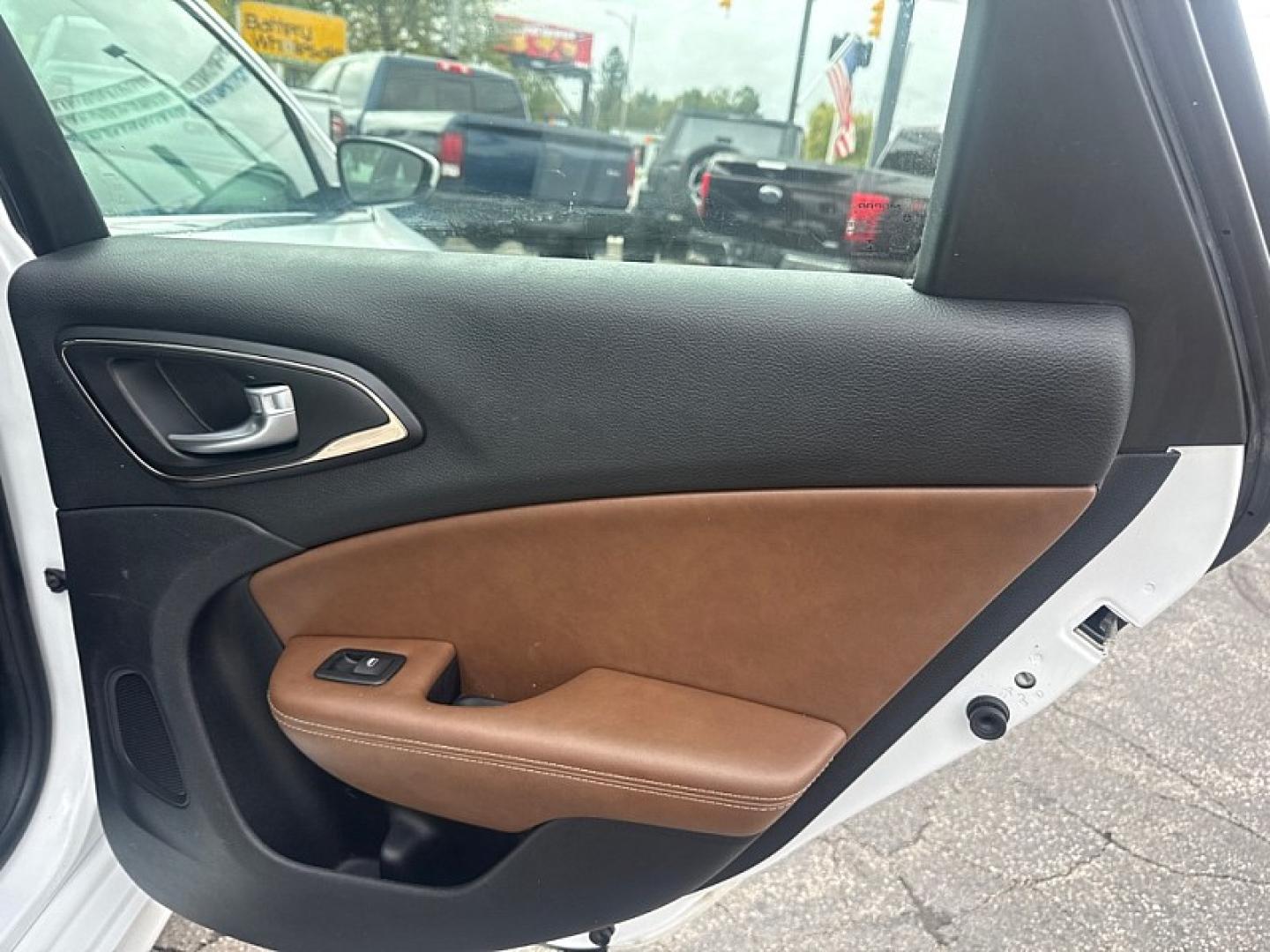 2016 WHITE /BROWN Chrysler 200 C (1C3CCCCG5GN) with an 3.6L V6 DOHC 24V FFV engine, 9A transmission, located at 3304 Woodville Road, Northwood, OH, 43619, (419) 210-8019, 41.612694, -83.480743 - Your #1 Destination for Auto Loans and mdash;No Matter Your Credit!At our dealership, we believe everyone deserves the opportunity to drive their dream car and mdash;whether you have good credit, bad credit, or no credit at all. With a wide selection of hundreds of cars, trucks, and SUVs, you'll fin- Photo#12