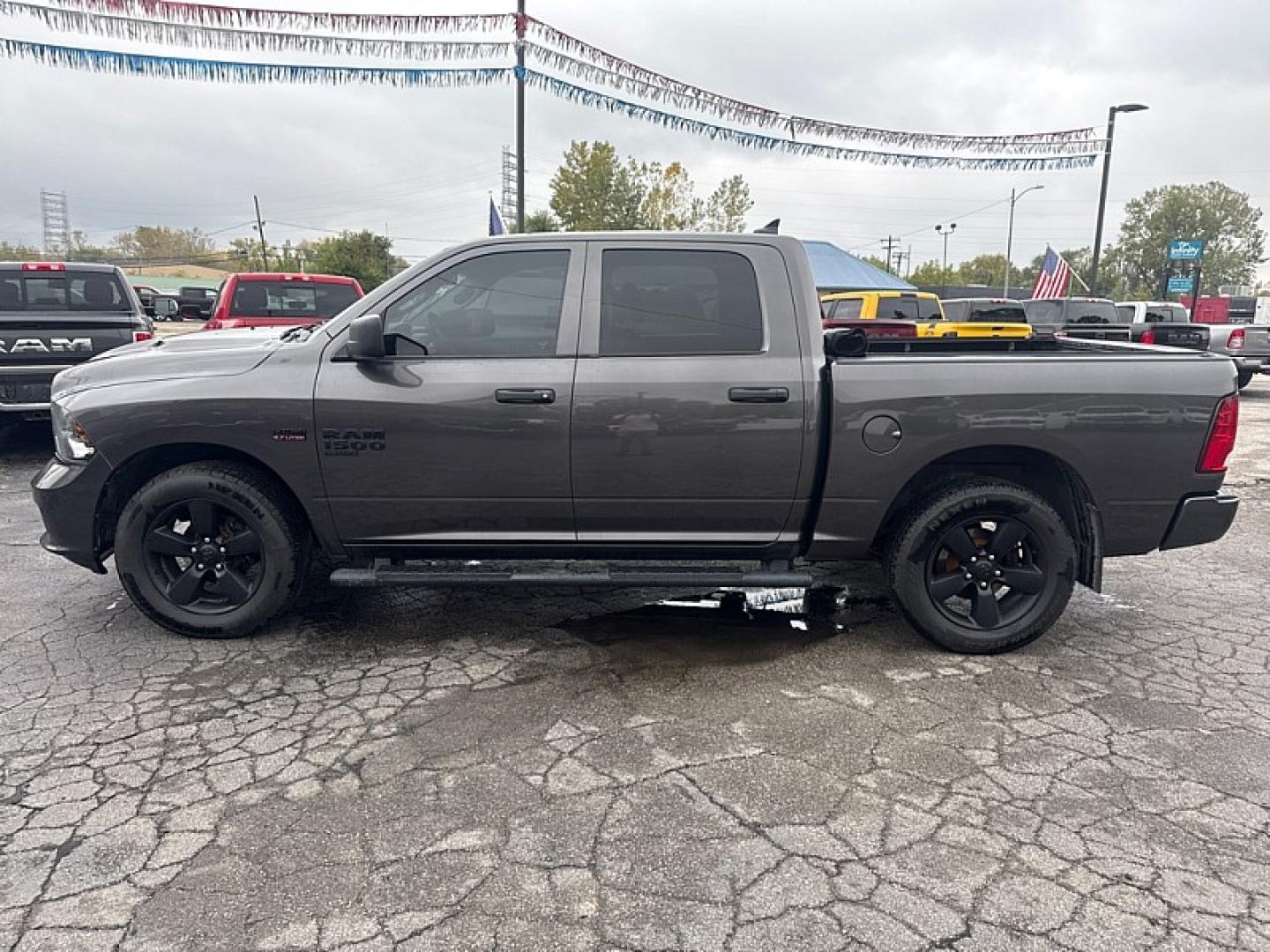 2019 GRAY /BLACK Ram 1500 Tradesman Crew Cab SWB 4WD (1C6RR7KT6KS) with an 5.7L V8 OHV 16V engine, 8A transmission, located at 3304 Woodville Road, Northwood, OH, 43619, (419) 210-8019, 41.612694, -83.480743 - Your #1 Destination for Auto Loans and mdash;No Matter Your Credit!At our dealership, we believe everyone deserves the opportunity to drive their dream car and mdash;whether you have good credit, bad credit, or no credit at all. With a wide selection of hundreds of cars, trucks, and SUVs, you'll fin- Photo#1