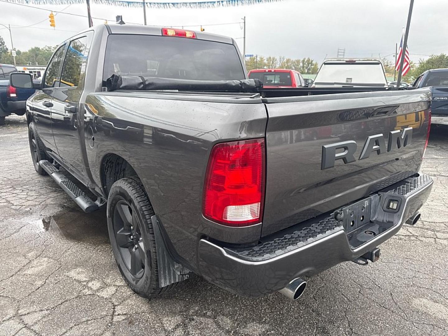 2019 GRAY /BLACK Ram 1500 Tradesman Crew Cab SWB 4WD (1C6RR7KT6KS) with an 5.7L V8 OHV 16V engine, 8A transmission, located at 3304 Woodville Road, Northwood, OH, 43619, (419) 210-8019, 41.612694, -83.480743 - Your #1 Destination for Auto Loans and mdash;No Matter Your Credit!At our dealership, we believe everyone deserves the opportunity to drive their dream car and mdash;whether you have good credit, bad credit, or no credit at all. With a wide selection of hundreds of cars, trucks, and SUVs, you'll fin- Photo#2