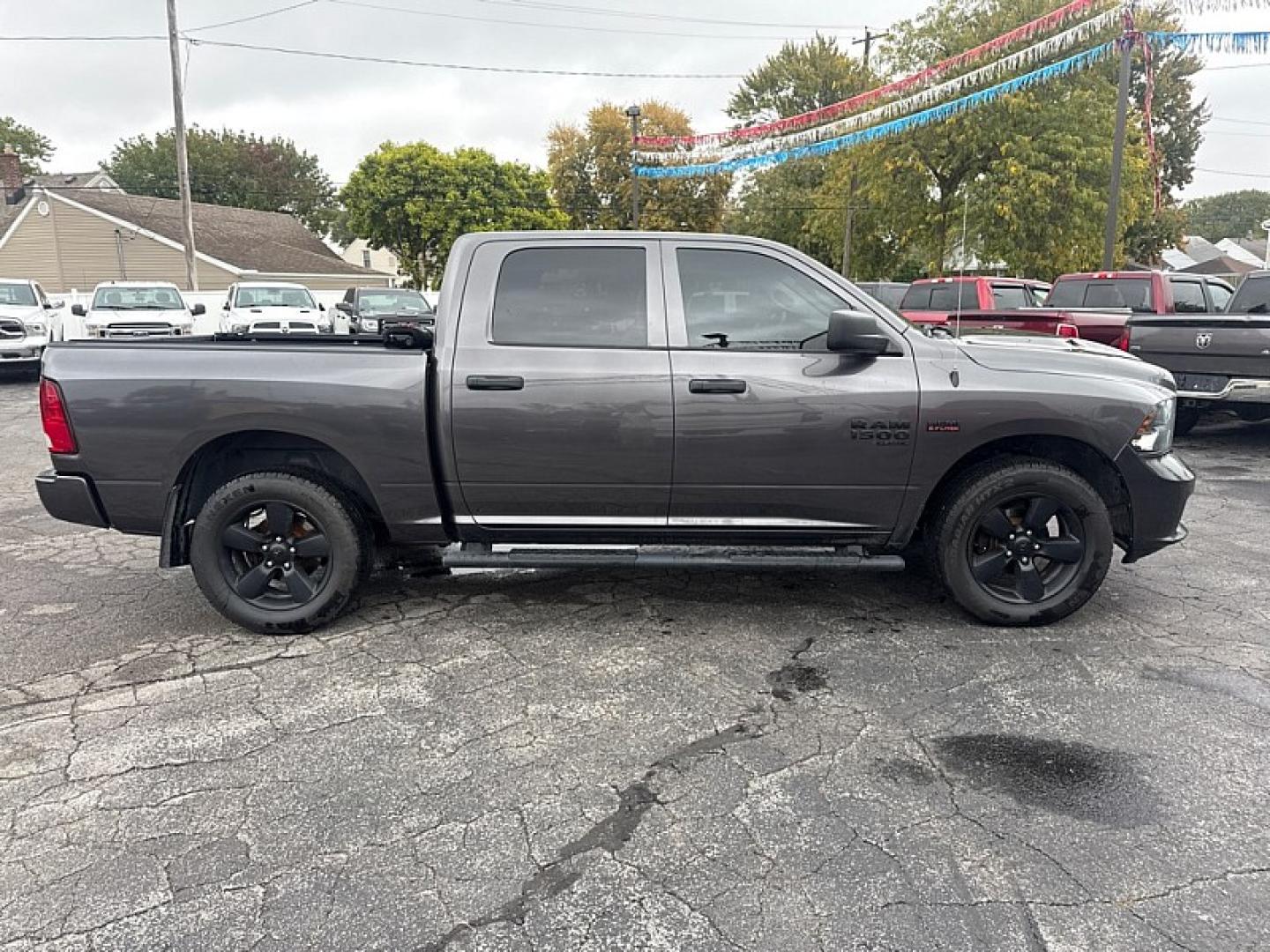 2019 GRAY /BLACK Ram 1500 Tradesman Crew Cab SWB 4WD (1C6RR7KT6KS) with an 5.7L V8 OHV 16V engine, 8A transmission, located at 3304 Woodville Road, Northwood, OH, 43619, (419) 210-8019, 41.612694, -83.480743 - Your #1 Destination for Auto Loans and mdash;No Matter Your Credit!At our dealership, we believe everyone deserves the opportunity to drive their dream car and mdash;whether you have good credit, bad credit, or no credit at all. With a wide selection of hundreds of cars, trucks, and SUVs, you'll fin- Photo#5