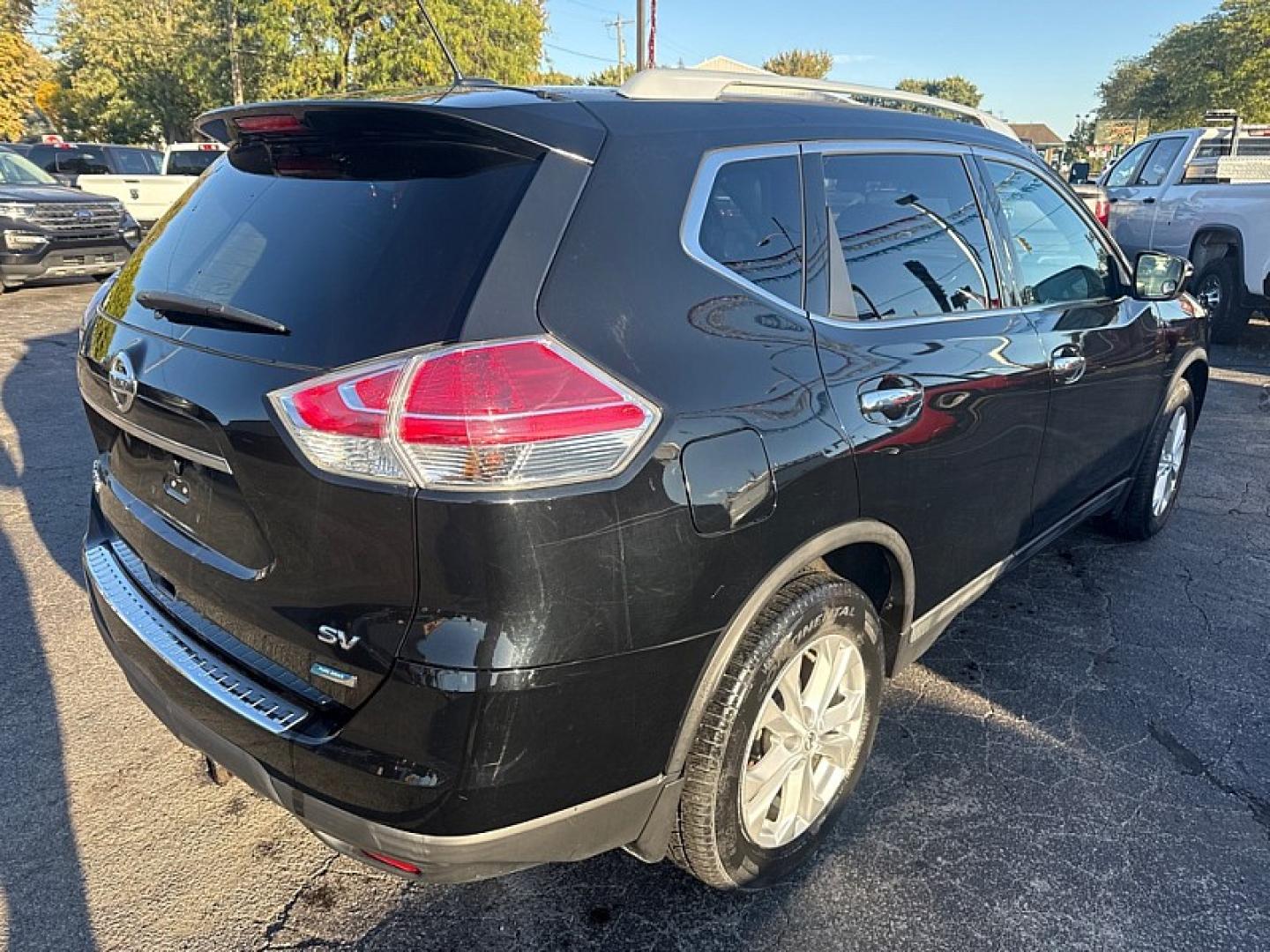 2015 BLACK /BLACK Nissan Rogue S 2WD (5N1AT2MT1FC) with an 2.5L L4 DOHC 16V engine, Continuously Variable Transmission transmission, located at 3304 Woodville Road, Northwood, OH, 43619, (419) 210-8019, 41.612694, -83.480743 - Your #1 Destination for Auto Loans and mdash;No Matter Your Credit!At our dealership, we believe everyone deserves the opportunity to drive their dream car and mdash;whether you have good credit, bad credit, or no credit at all. With a wide selection of hundreds of cars, trucks, and SUVs, you'll fin- Photo#4