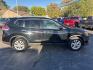 2015 BLACK /BLACK Nissan Rogue S 2WD (5N1AT2MT1FC) with an 2.5L L4 DOHC 16V engine, Continuously Variable Transmission transmission, located at 3304 Woodville Road, Northwood, OH, 43619, (419) 210-8019, 41.612694, -83.480743 - Your #1 Destination for Auto Loans and mdash;No Matter Your Credit!At our dealership, we believe everyone deserves the opportunity to drive their dream car and mdash;whether you have good credit, bad credit, or no credit at all. With a wide selection of hundreds of cars, trucks, and SUVs, you'll fin- Photo#5