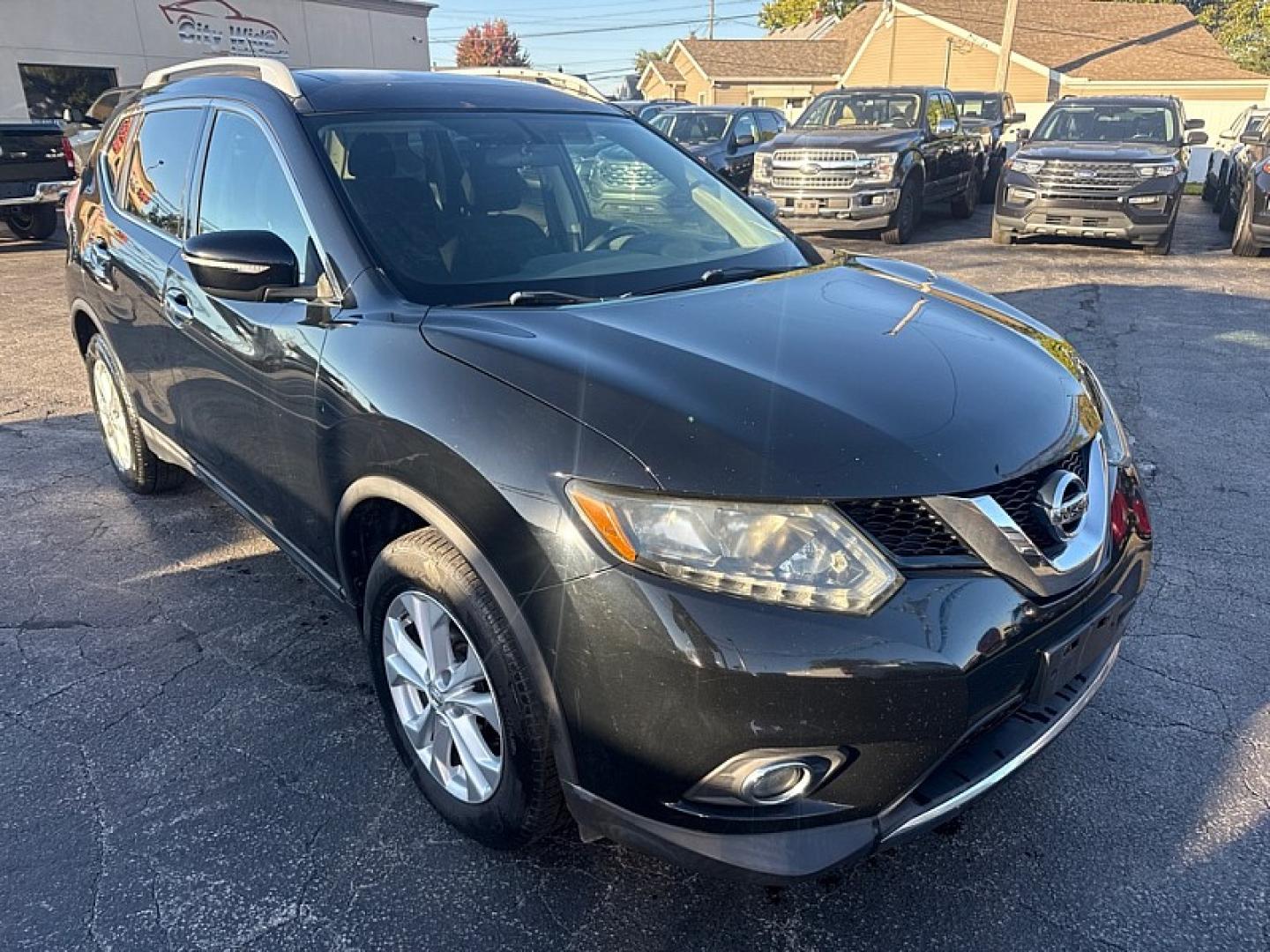 2015 BLACK /BLACK Nissan Rogue S 2WD (5N1AT2MT1FC) with an 2.5L L4 DOHC 16V engine, Continuously Variable Transmission transmission, located at 3304 Woodville Road, Northwood, OH, 43619, (419) 210-8019, 41.612694, -83.480743 - Your #1 Destination for Auto Loans and mdash;No Matter Your Credit!At our dealership, we believe everyone deserves the opportunity to drive their dream car and mdash;whether you have good credit, bad credit, or no credit at all. With a wide selection of hundreds of cars, trucks, and SUVs, you'll fin- Photo#6