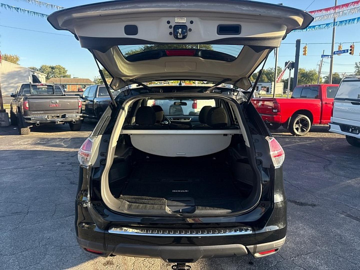2015 BLACK /BLACK Nissan Rogue S 2WD (5N1AT2MT1FC) with an 2.5L L4 DOHC 16V engine, Continuously Variable Transmission transmission, located at 3304 Woodville Road, Northwood, OH, 43619, (419) 210-8019, 41.612694, -83.480743 - Your #1 Destination for Auto Loans and mdash;No Matter Your Credit!At our dealership, we believe everyone deserves the opportunity to drive their dream car and mdash;whether you have good credit, bad credit, or no credit at all. With a wide selection of hundreds of cars, trucks, and SUVs, you'll fin- Photo#8